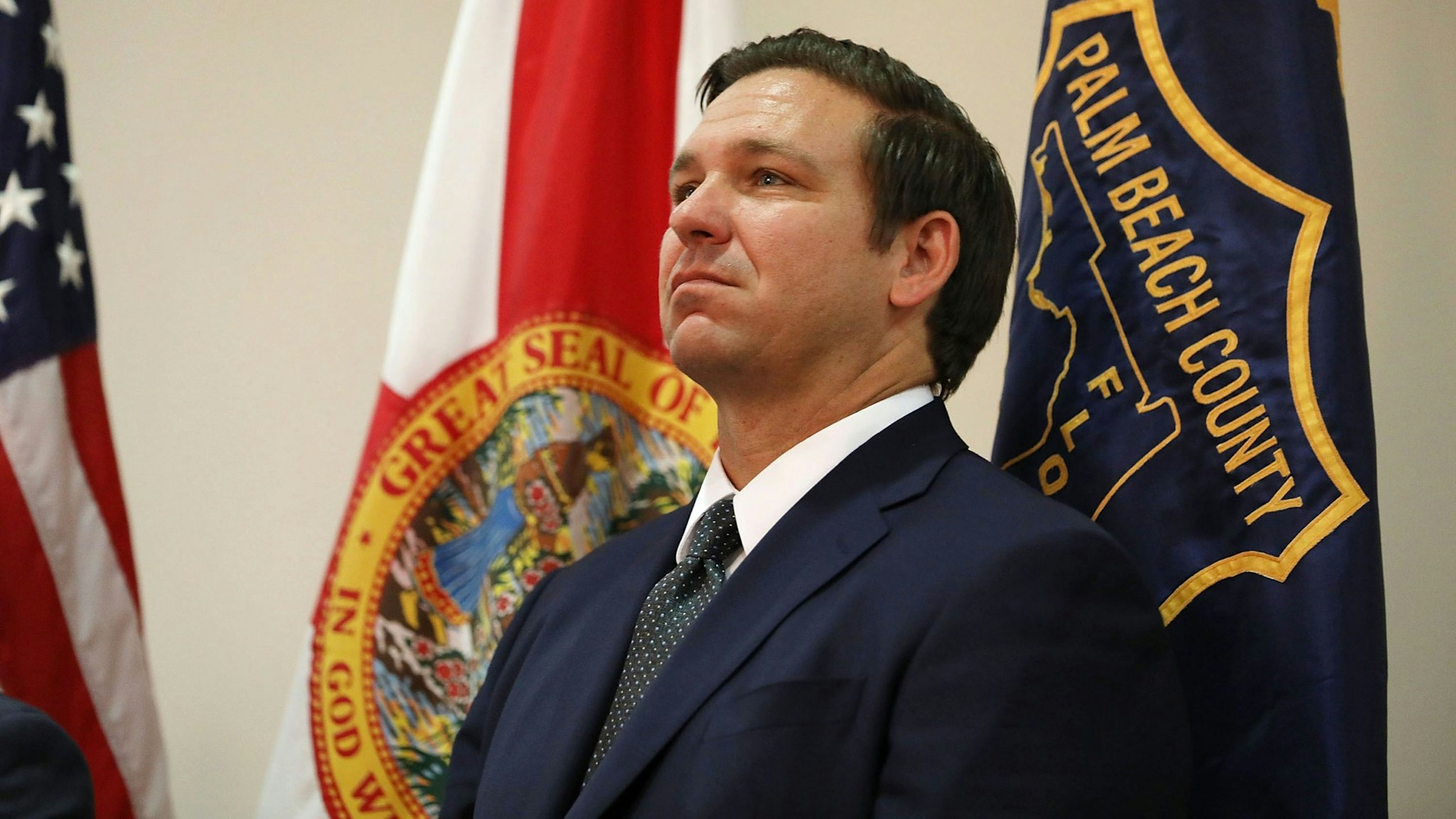 WEST PALM BEACH, FL - OCTOBER 03: Republican candidate for Florida governor Ron DeSantis waits to be introduced during an event put on by the Police Benevolent Association in Palm Beach County on October 3, 2018 in West Palm Beach, Florida. DeSantis is facing off against Democratic challenger Andrew Gillum to be the next Florida governor.