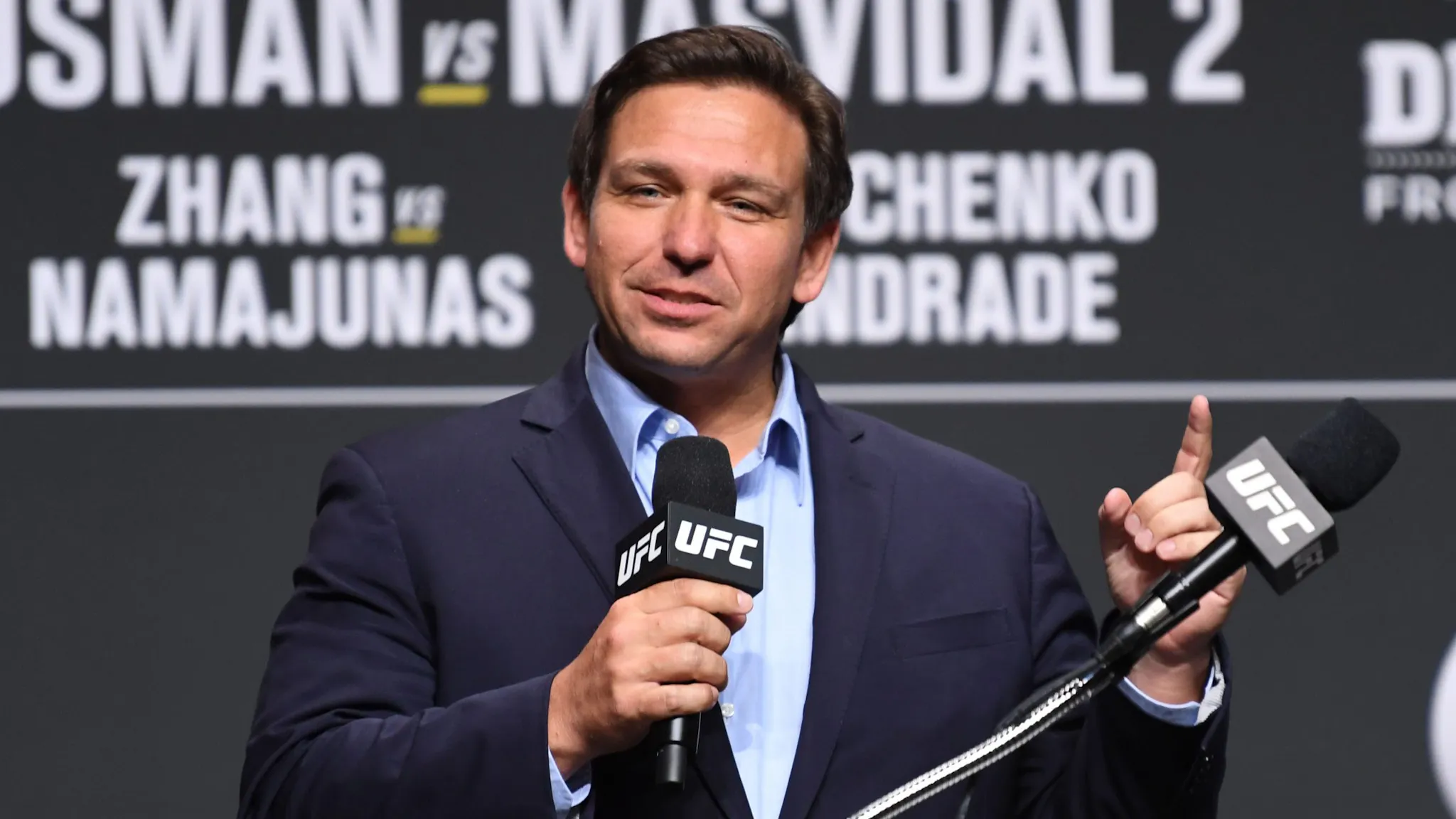 UFC 261 Press Conference JACKSONVILLE, FLORIDA - APRIL 22: Florida Gov. Ron DeSantis interacts with media during the UFC 261 press conference at VyStar Veterans Memorial Arena on April 22, 2021 in Jacksonville, Florida.