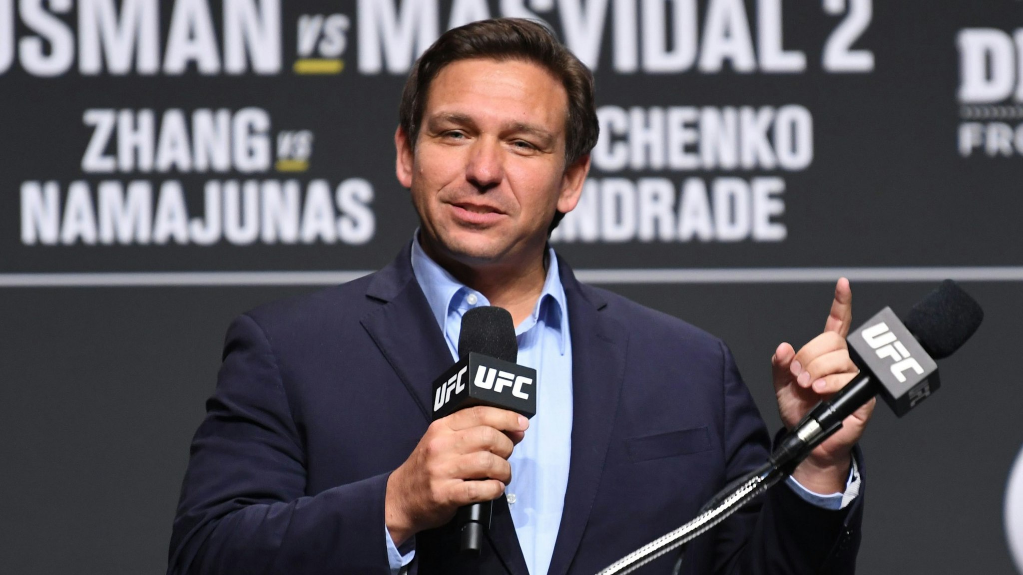 JACKSONVILLE, FLORIDA - APRIL 22: Florida Gov. Ron DeSantis interacts with media during the UFC 261 press conference at VyStar Veterans Memorial Arena on April 22, 2021 in Jacksonville, Florida.