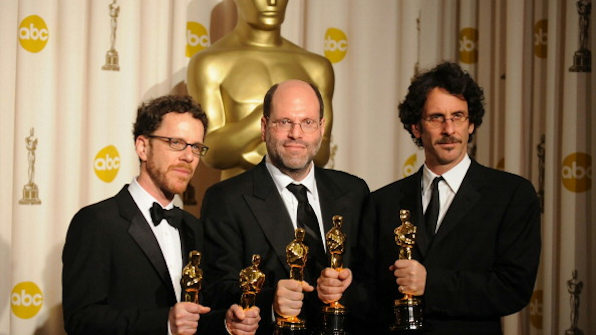 Producers Ethan Coen, Scott Rudin, and Joel Coen poses in the press room during the 80th Annual Academy Awards at the Kodak Theatre on February 24, 2008 in Los Angeles, California.