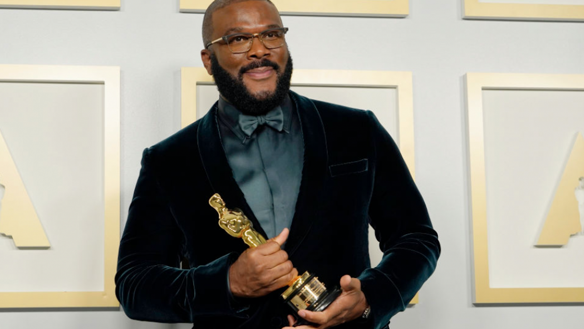 Tyler Perry, winner of the Jean Hersholt Humanitarian Award, poses in the press room during the Oscars on Sunday, April 25, 2021, at Union Station in Los Angeles.