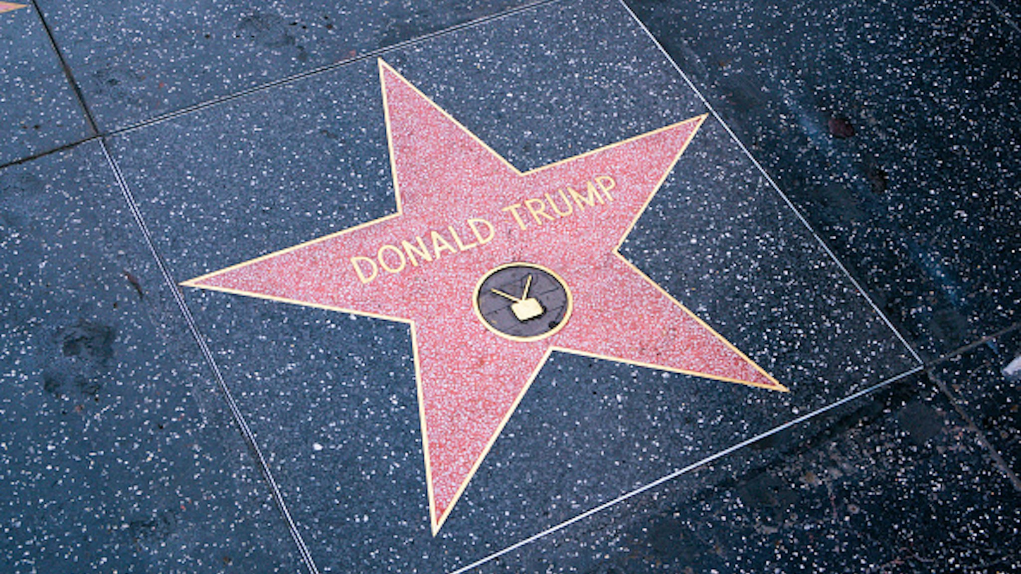 HOLLYWOOD, CA - APRIL 21: General view of Donald Trump's Star on the Walk of Fame, unveiled for the first time after being destroyed in early October 2020 and then covered with plywood for months, after being re-forged on April 21, 2021 in Hollywood, California.