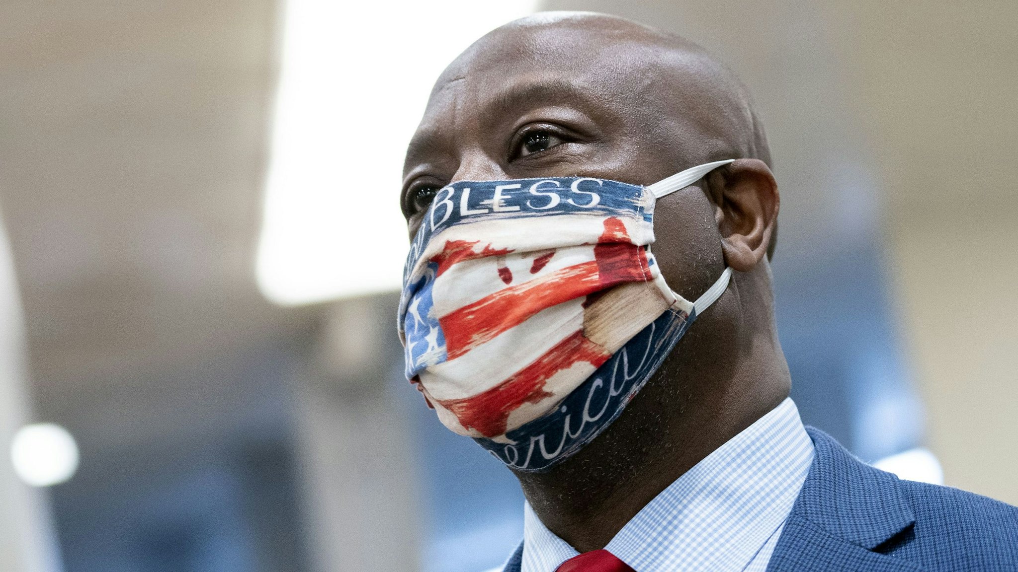 Senator Tim Scott, a Republican from South Carolina, wears a protective mask while walking through the Senate Subway of the U.S. Capitol in Washington, D.C., U.S., on Tuesday, Dec. 1, 2020. Senate Majority Leader Mitch McConnell said yesterday lawmakers need to finish government funding and defense policy bills before the end of the year and urged Congress to pass virus-relief legislation covering areas Democrats and Republicans agree on.