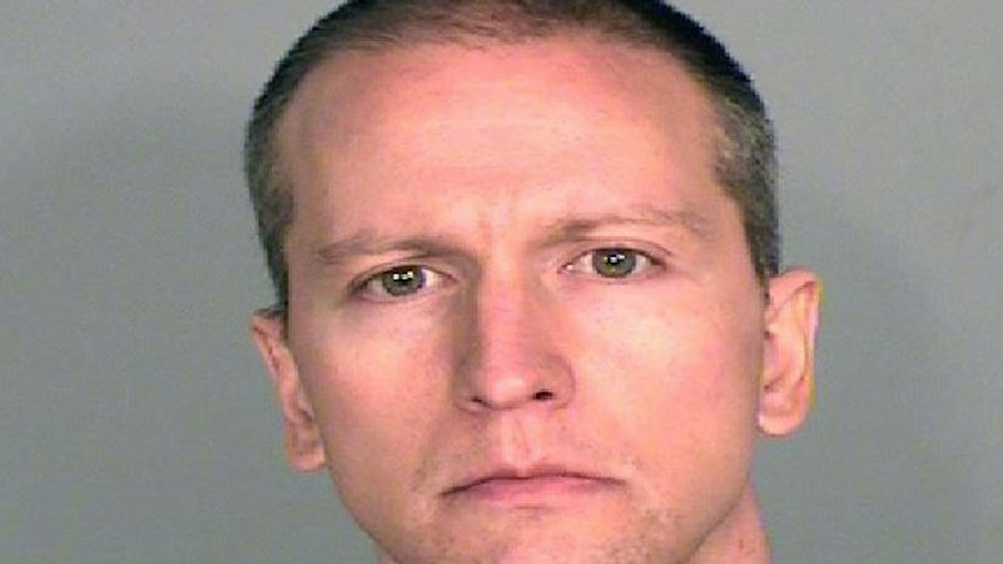 UNSPECIFIED LOCATION AND DATE: (EDITORS NOTE: Best quality available) In this handout provided by Ramsey County Sheriff's Office, former Minneapolis police officer Derek Chauvin poses for a mugshot after being charged in the death of George Floyd . Bail for Chauvin, who is charged with third-degree murder and manslaughter, is set at $500,000. The death sparked riots and protests in cities throughout the country after Floyd, a black man, was killed in police custody in Minneapolis on May 25. (Photo by