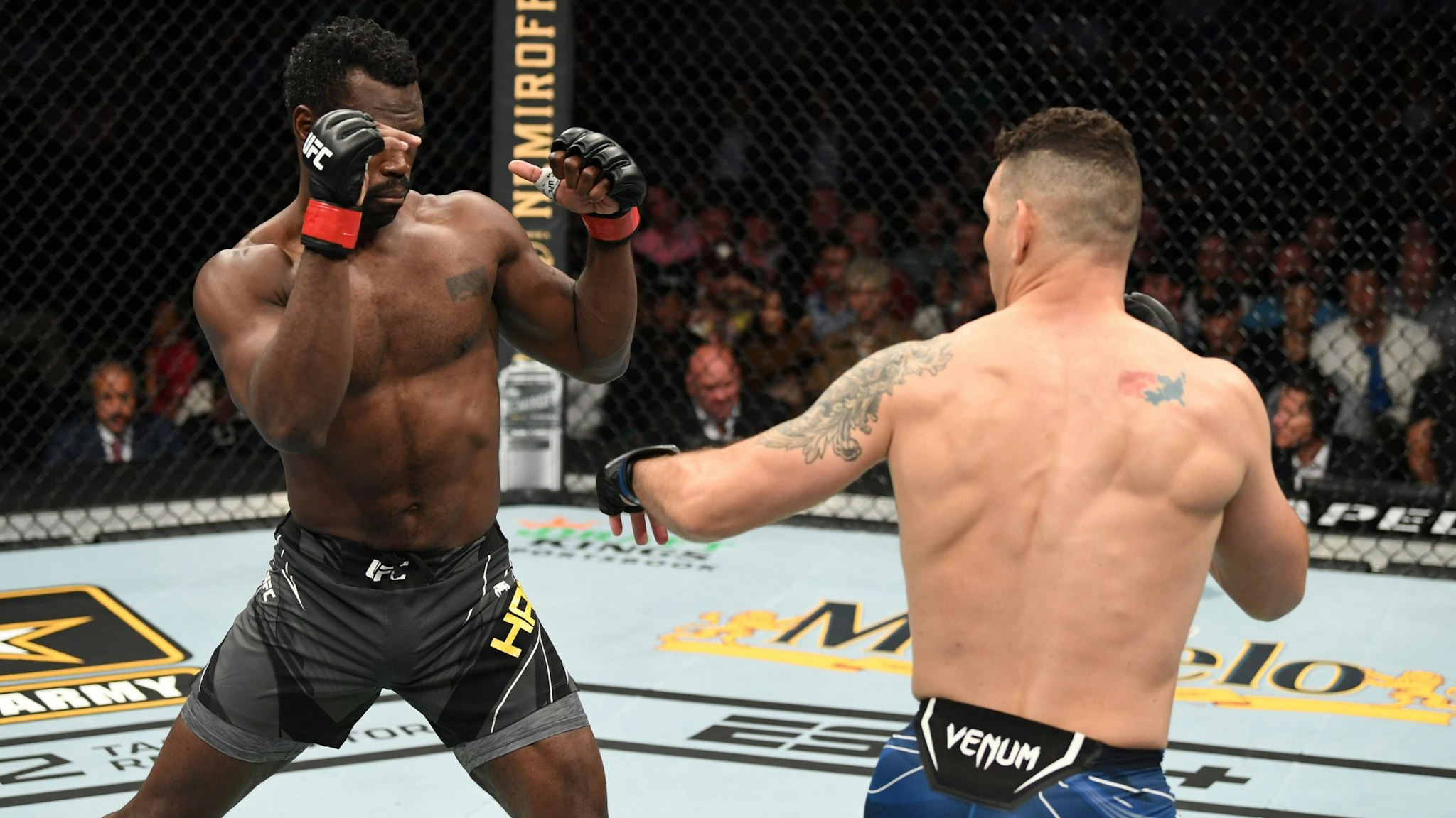 JACKSONVILLE, FLORIDA - APRIL 24: (L-R) Uriah Hall of Jamaica and Chris Weidman face each other in their middleweight bout during the UFC 261 event at VyStar Veterans Memorial Arena on April 24, 2021 in Jacksonville, Florida.