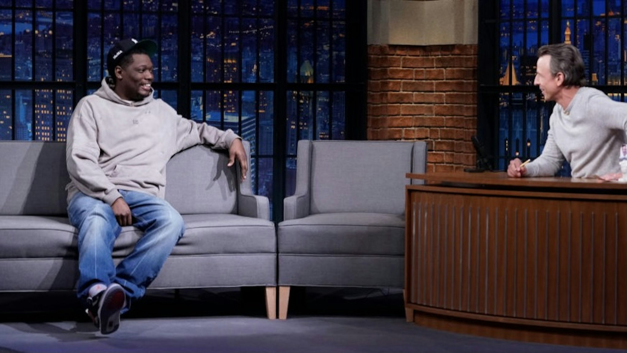 Late Night with Seth Meyers - Season 8 LATE NIGHT WITH SETH MEYERS -- Episode 1139A -- Pictured: (l-r) Comedian Michael Che during an interview with host Seth Meyers on May 3, 2021 -- (Photo by: Lloyd Bishop/NBC/NBCU Photo Bank via Getty Images)