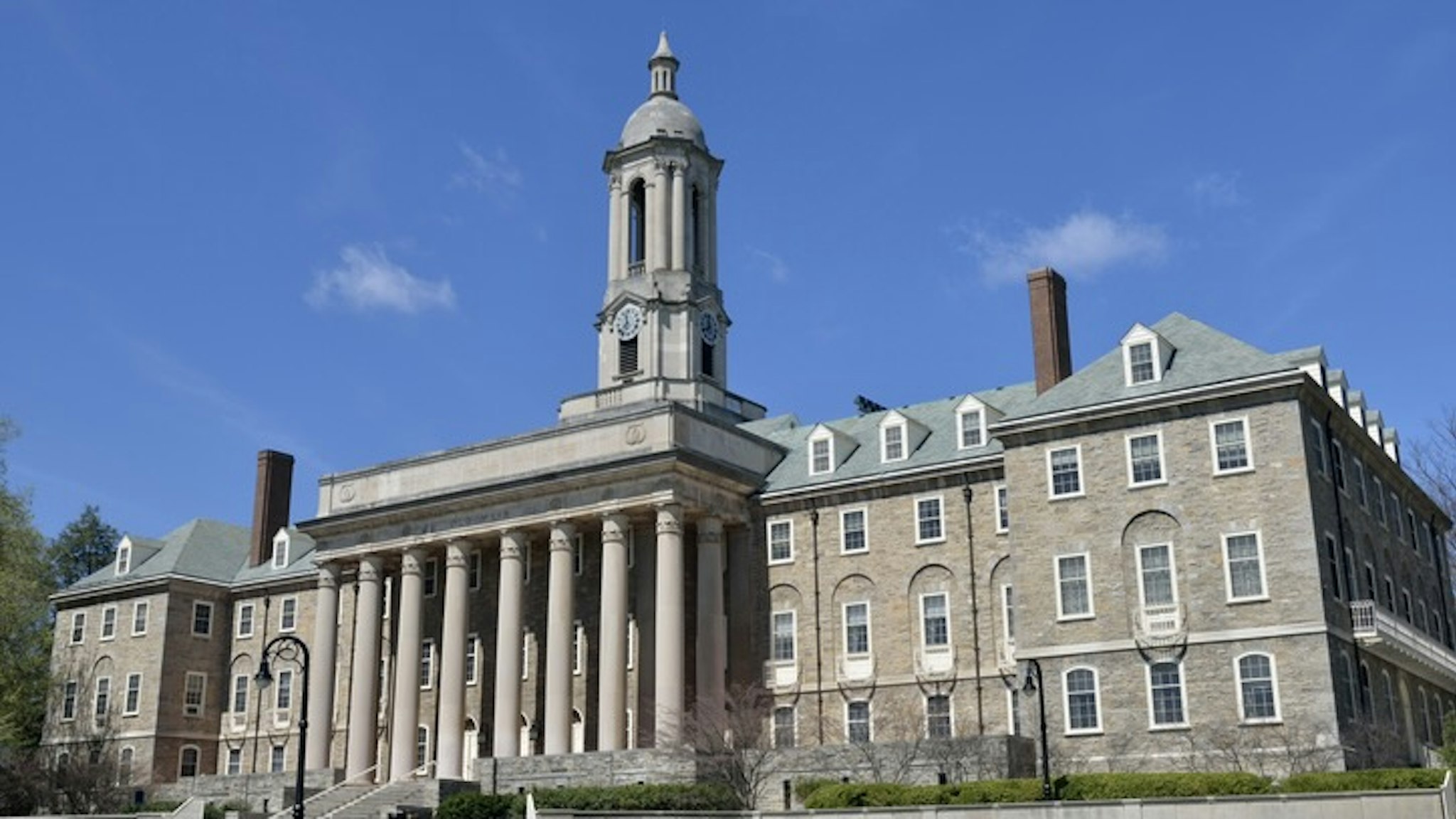 Old Main in Penn State - stock photo Old Main building in the main campus of Pennsylvania State University, State College, Pennsylvania, USA aimintang via Getty Images
