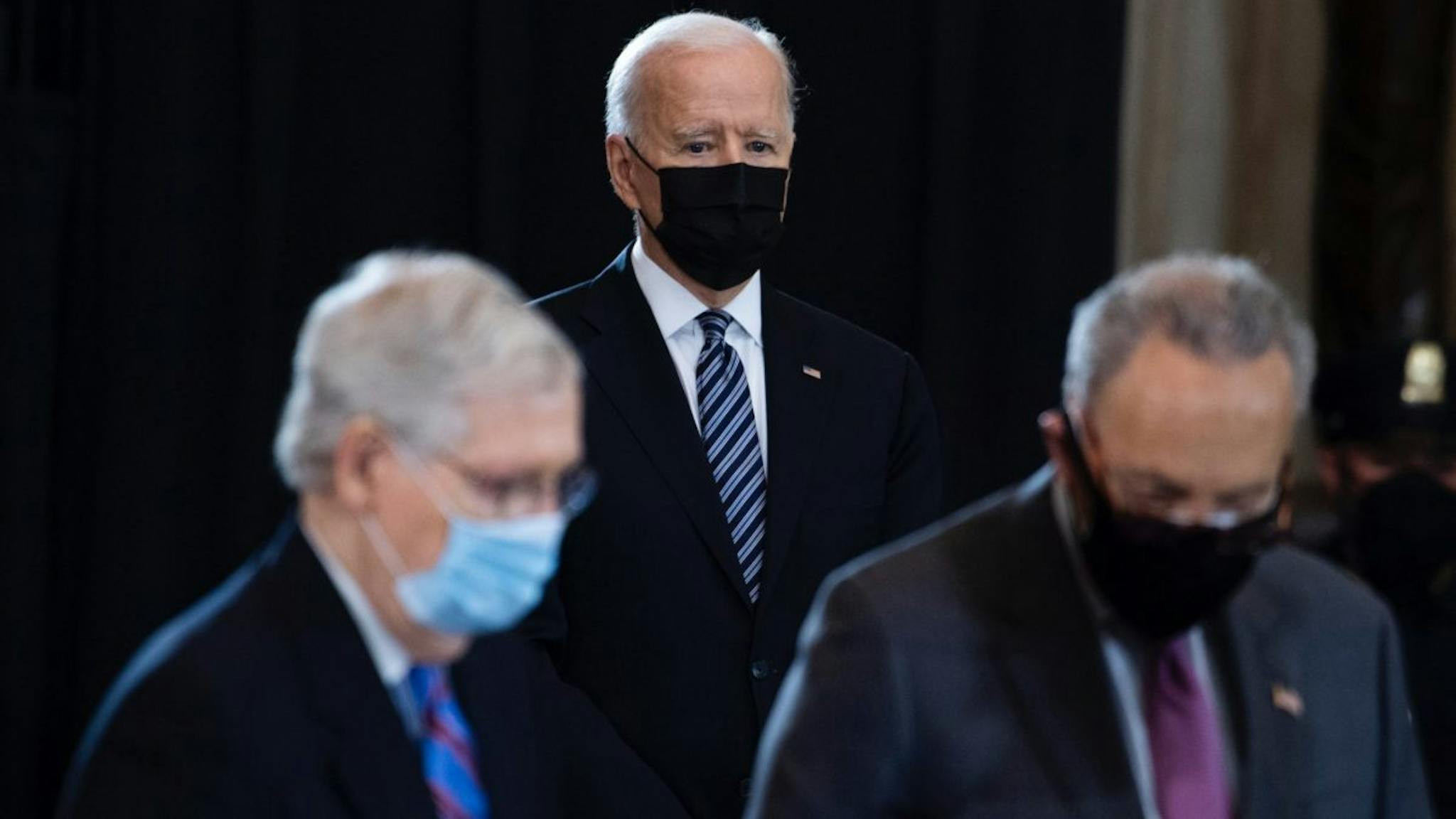 Bide, Schumer, McConnell President Joe Biden, Senate Majority Leader Chuck Schumer, D-N.Y., right, and Minority Leader Mitch McConnell, R-Ky., pay respects to U.S. Capitol Police Officer William Billy Evans, as his remains lie in honor in the Capitol Rotunda in Washington, D.C., on Tuesday, April 13, 2021.