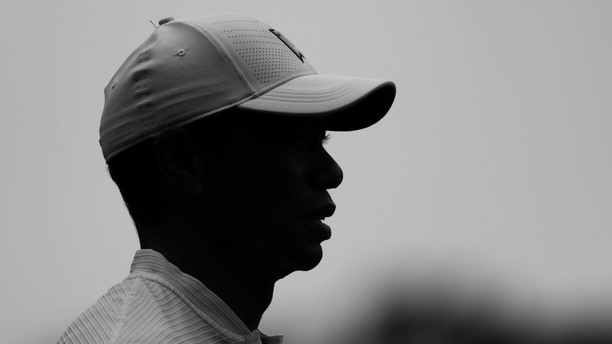 The Masters - Preview Day 3 AUGUSTA, GEORGIA - NOVEMBER 11: (EDITOR'S NOTE:This image has been converted to black and white.) Tiger Woods looks on during a practice round prior to the Masters at Augusta National Golf Club on November 11, 2020 in Augusta, Georgia. (Photo by Patrick Smith/Getty Images) Patrick Smith / Staff via Getty Images