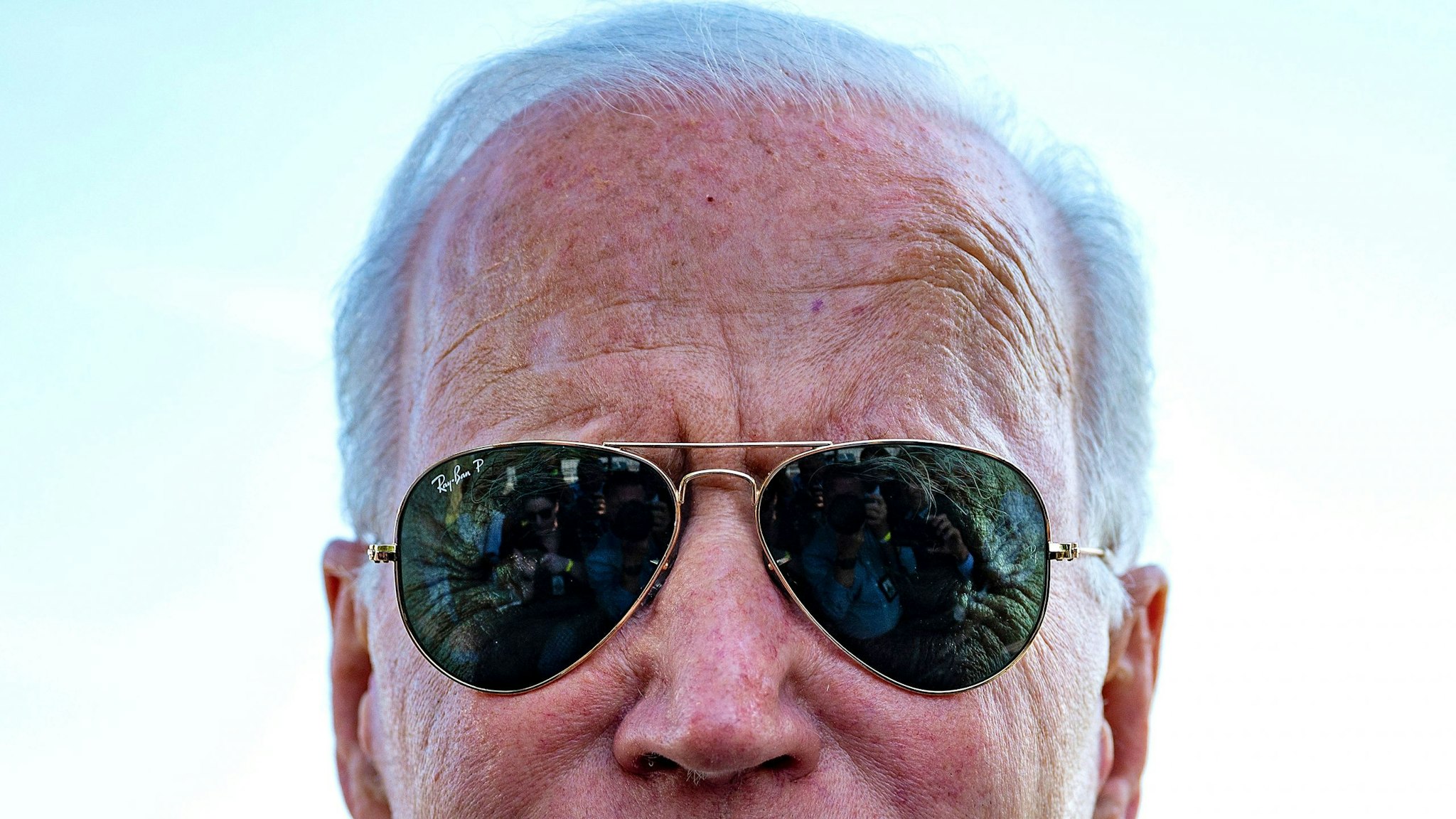 TOPSHOT - US President Joe Biden speaks to the press as he departs the White House in Washington, DC, on May 25, 2021.