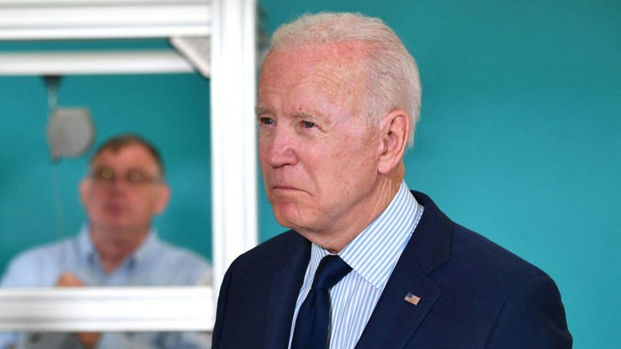 US President Joe Biden looks on during a tour of the Cuyahoga Community College Manufacturing Technology Center, on May 27, 2021, in Cleveland, Ohio.