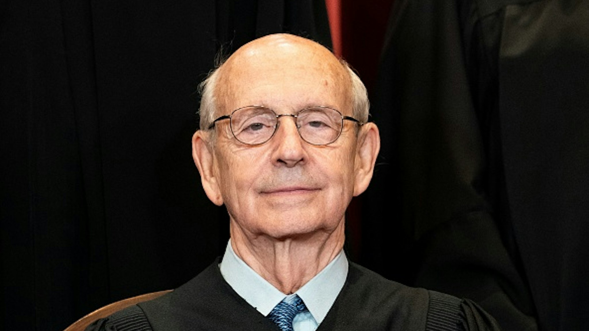 Associate Justice Stephen Breyer sits during a group photo of the Justices at the Supreme Court in Washington, DC on April 23, 2021.