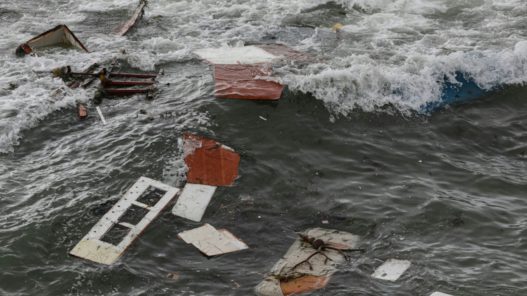 SAN DIEGO, CA - MAY 02: Debris is littered along the shoreline off Cabrillo Monument on May 2, 2021 in San Diego, California. Two people died and Twenty were rescued after a vessel overturned on Sunday afternoon off Point Loma area of San Diego Photo by Sandy Huffaker / Getty Images / Stringer via Getty Images