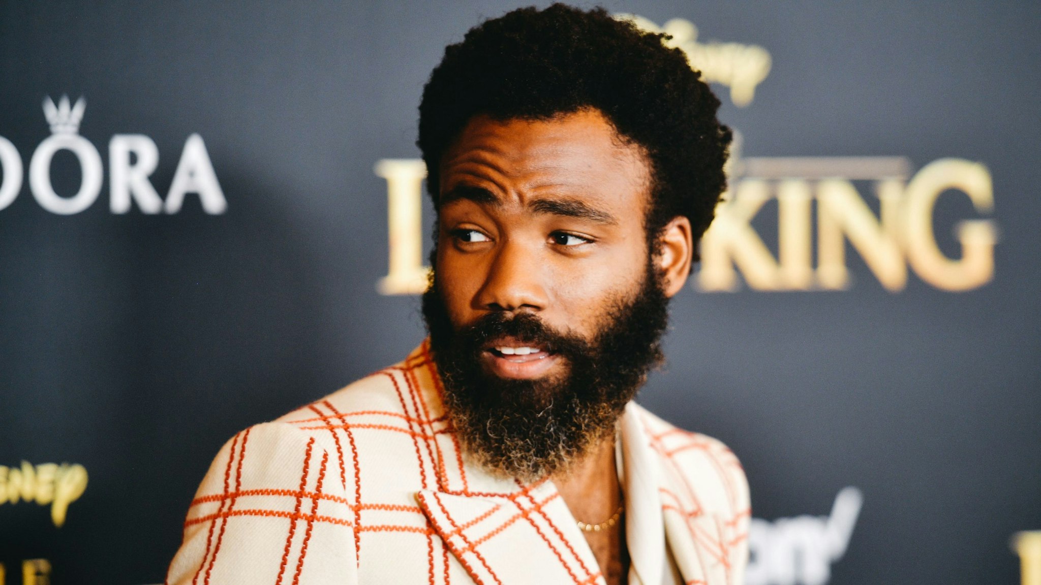 HOLLYWOOD, CALIFORNIA - JULY 09: (EDITORS NOTE: Image has been edited using digital filters) Donald Glover attends the premiere of Disney's "The Lion King" at Dolby Theatre on July 09, 2019 in Hollywood, California.