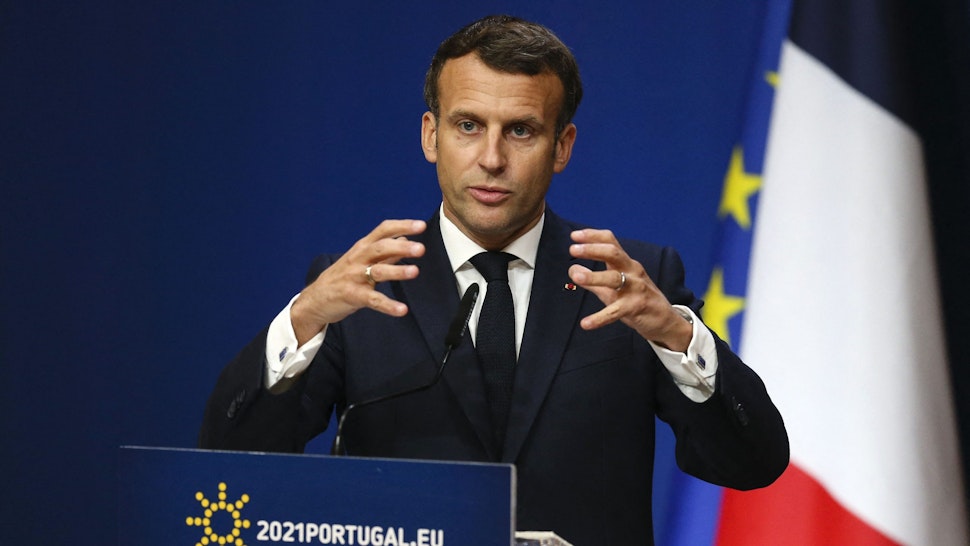 France's President Emmanuel Macron gives a press conference during the European Social Summit hosted by the Portuguese presidency of the Council of the European Union at the Palacio de Cristal in Porto on May 8, 2021.
