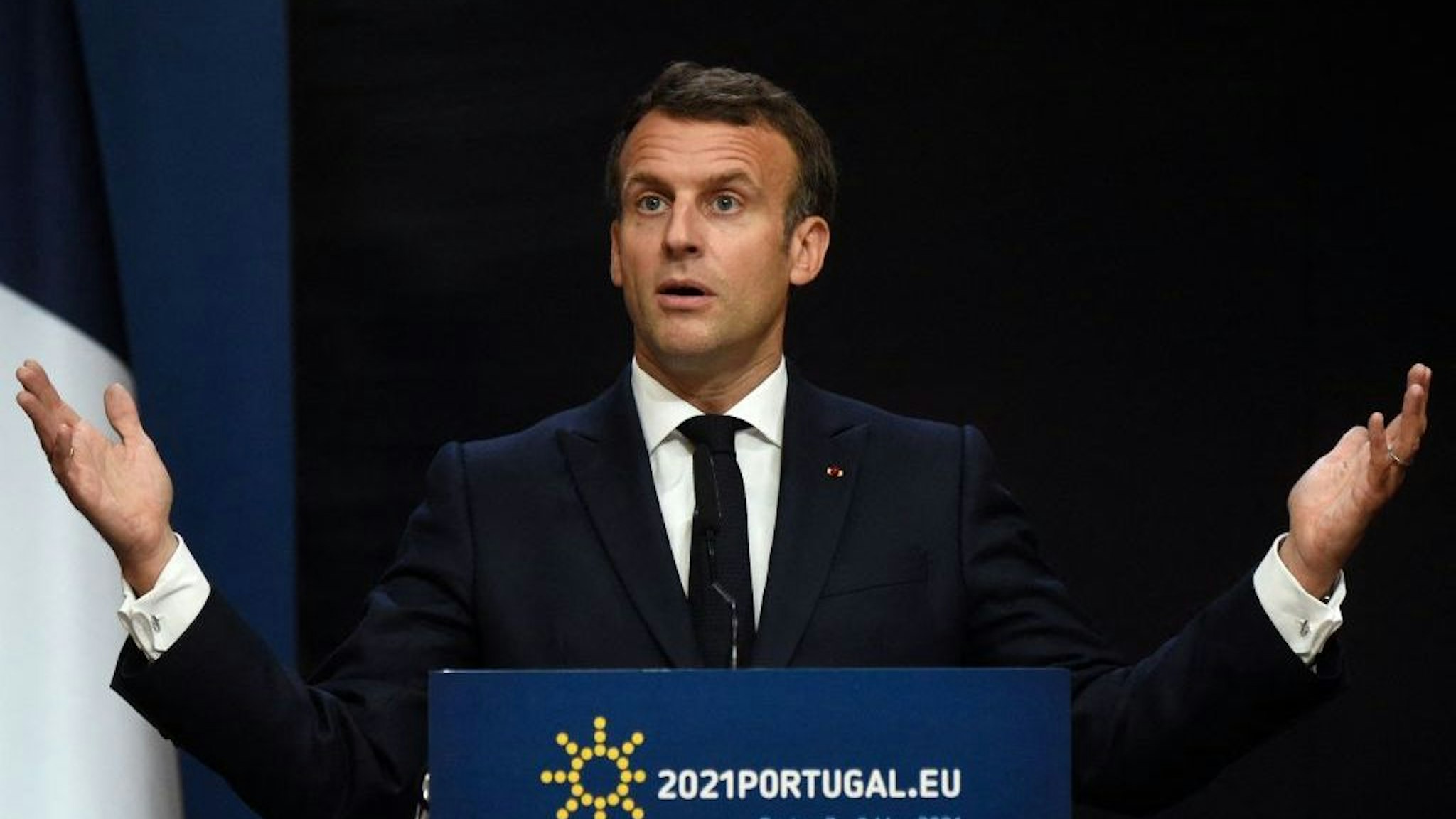 France's President Emmanuel Macron gives a press conference during the European Social Summit hosted by the Portuguese presidency of the Council of the European Union at the Palacio de Cristal in Porto on May 8, 2021. (Photo by MIGUEL RIOPA / POOL / AFP) (Photo by MIGUEL RIOPA/POOL/AFP via Getty Images)
