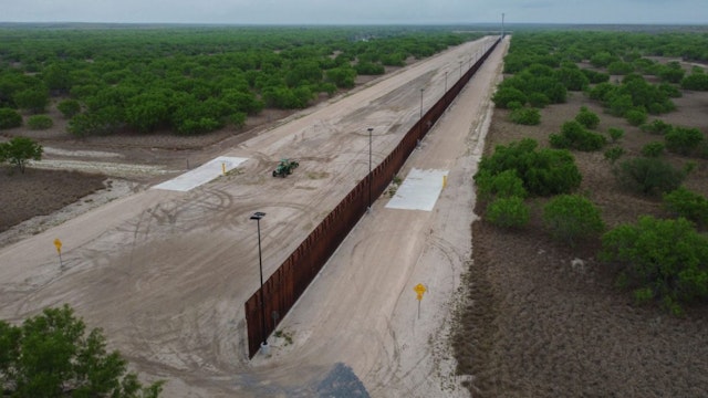 A photo taken on March 30, 2021 shows a general view of an unfinished section of a border wall that former US president Donald Trump tried to build near the southern Texas border city of Roma.