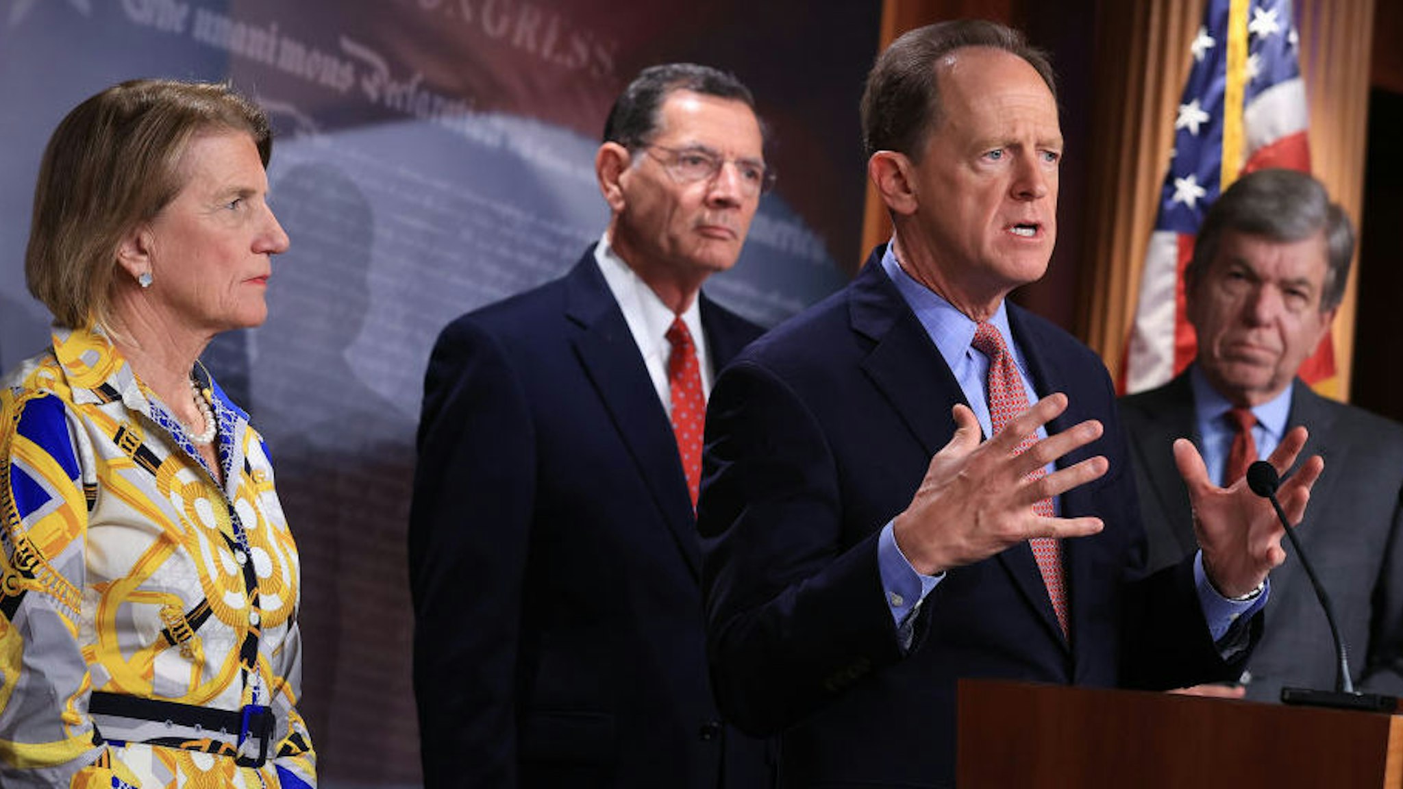 WASHINGTON, DC - MAY 27: Sen. Pat Toomey (R-PA) speaks during a news conference with Sen. Shelley Moore Capito (R-WV) (L), lead Republican negotiator with the Biden administration on infrastructure, Sen. John Barrasso (R-WY) and Sen. Roy Blunt (R-MO) (R) about the GOP's $928 billion counteroffer at the U.S. Capitol on May 27, 2021 in Washington, DC. Insisting that the 2017 Trump tax cuts remain untouched, Senate Republicans suggested that money not spent as part of the COVID-19 American Rescue Plan be diverted to infrastructure.