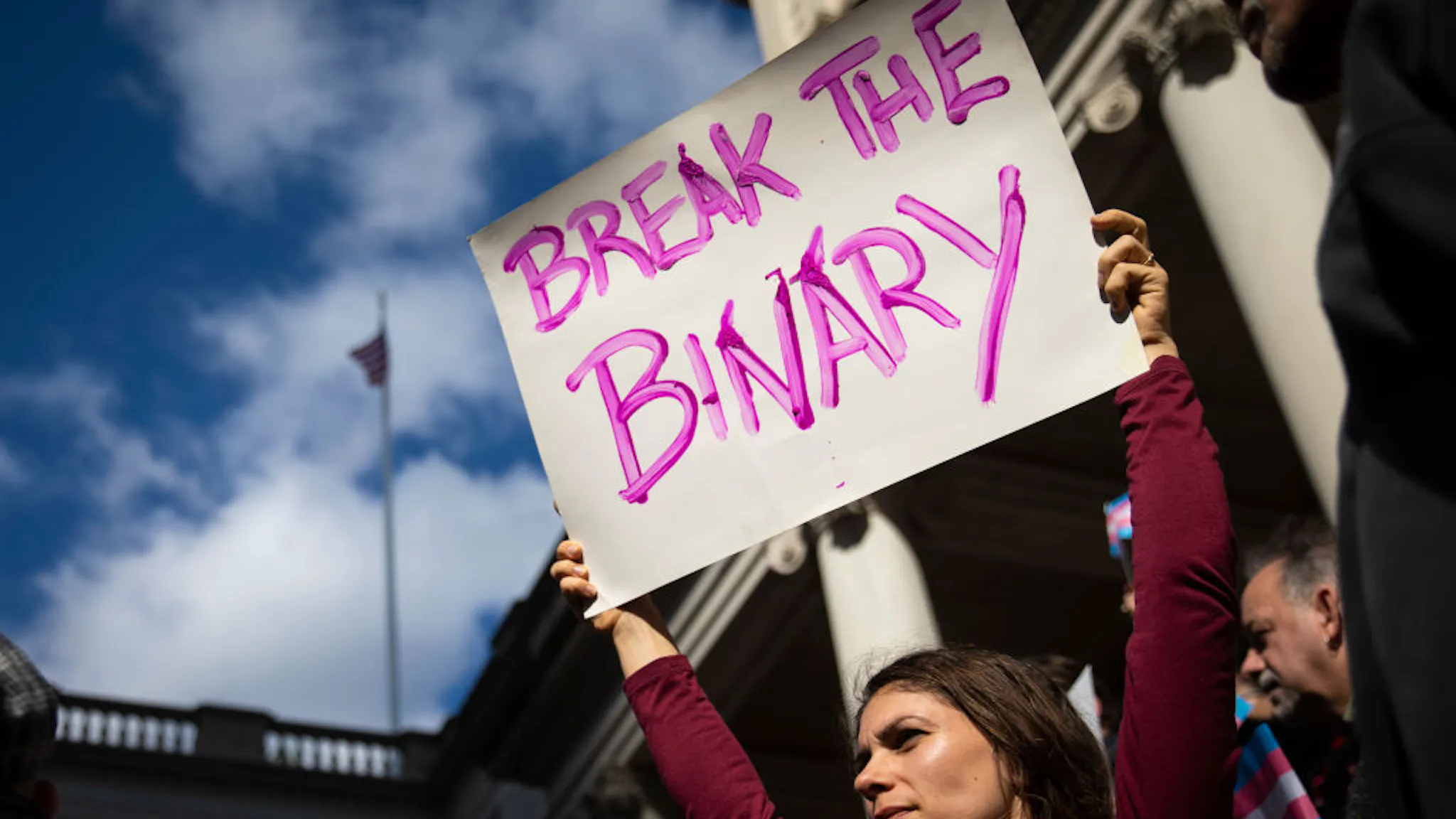 Transgender NEW YORK, NY - OCTOBER 24: L.G.B.T. activists and their supporters rally in support of transgender people on the steps of New York City Hall, October 24, 2018 in New York City. The group gathered to speak out against the Trump administration's stance toward transgender people. Last week, The New York Times reported on an unreleased administration memo that proposes a strict biological definition of gender based on a person's genitalia at birth.