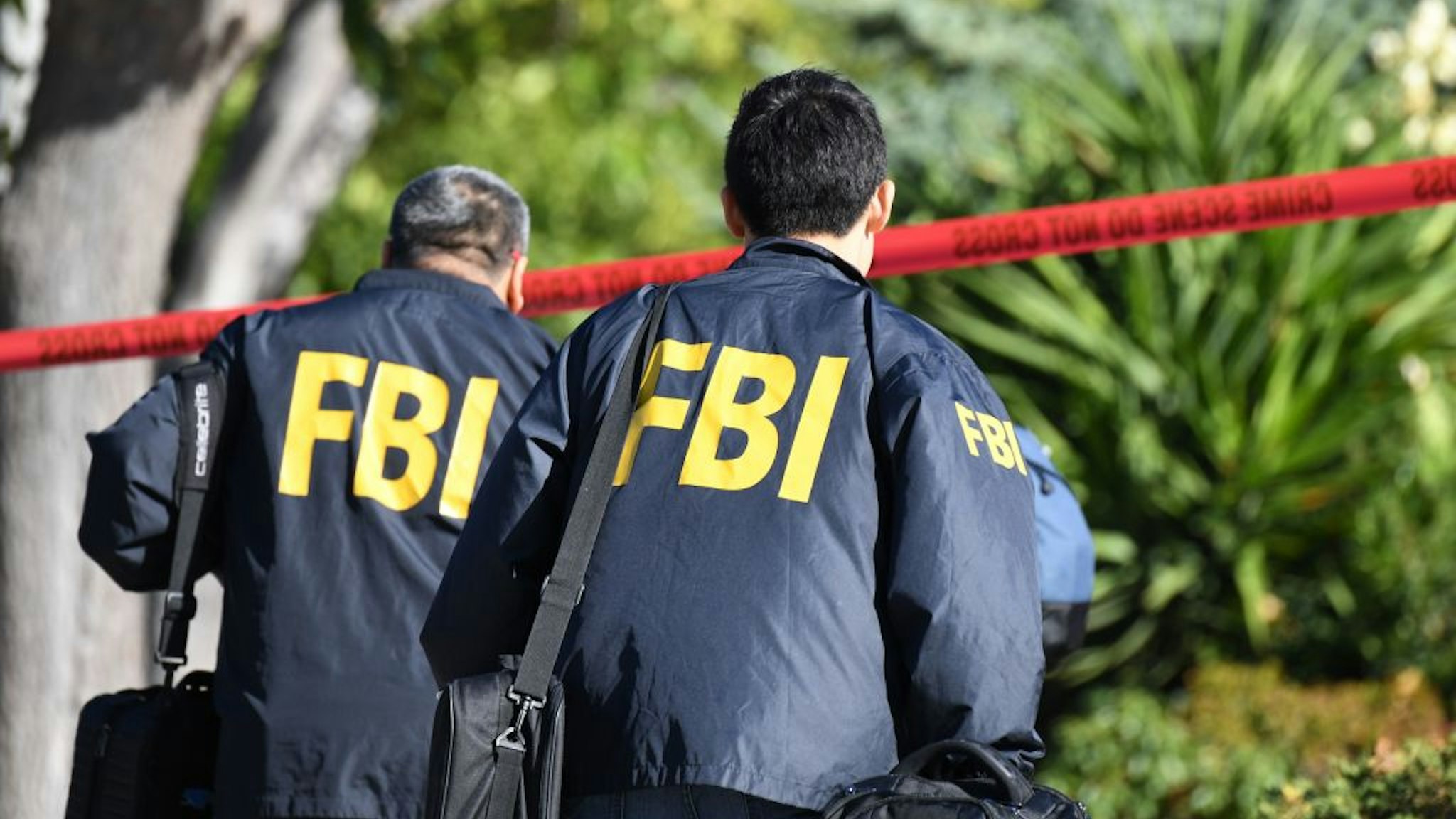 FBI investigators arrive at the home of suspected nightclub shooter Ian David Long on November 8 2018, in Thousand Oaks, California. - The gunman who killed 12 people in a crowded California country music bar has been identified as 28-year-old Ian David Long, a former Marine, the local sheriff said Thursday. The suspect, who was armed with a .45-caliber handgun, was found deceased at the Borderline Bar and Grill, the scene of the shooting in the city of Thousand Oaks northwest of downtown Los Angeles. (Photo by Robyn Beck / AFP) (Photo by ROBYN BECK/AFP via Getty Images)