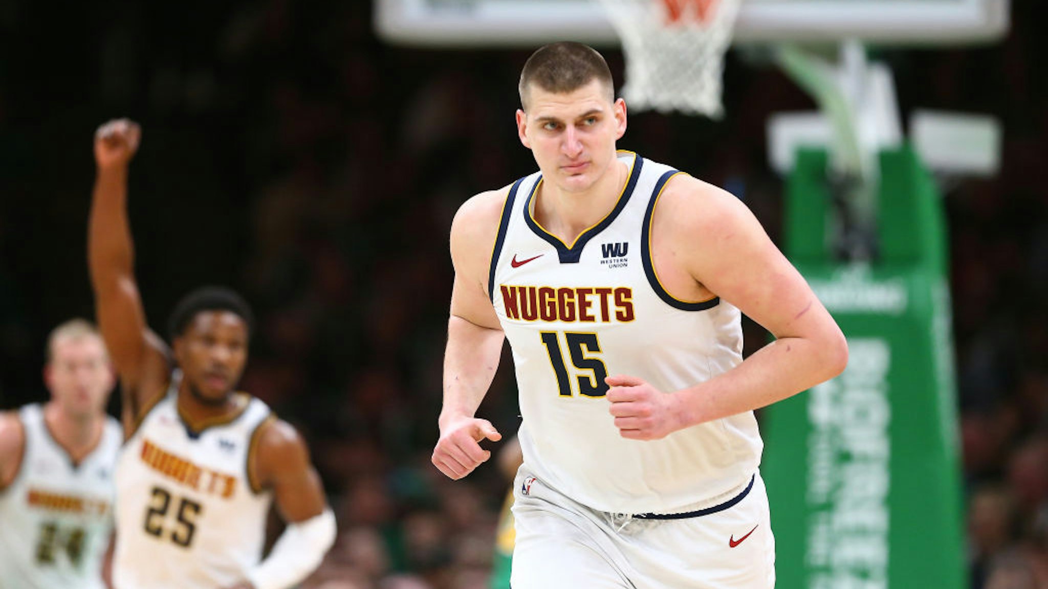BOSTON, MASSACHUSETTS - MARCH 18: Nikola Jokic #15 of the Denver Nuggets celebrates after scoring against the Boston Celtics during the second half at TD Garden on March 18, 2019 in Boston, Massachusetts. The Nuggets defeat the Celtics 114-105. NOTE TO USER: User expressly acknowledges and agrees that, by downloading and or using this photograph, User is consenting to the terms and conditions of the Getty Images License Agreement. (Photo by Maddie Meyer/Getty Images)
