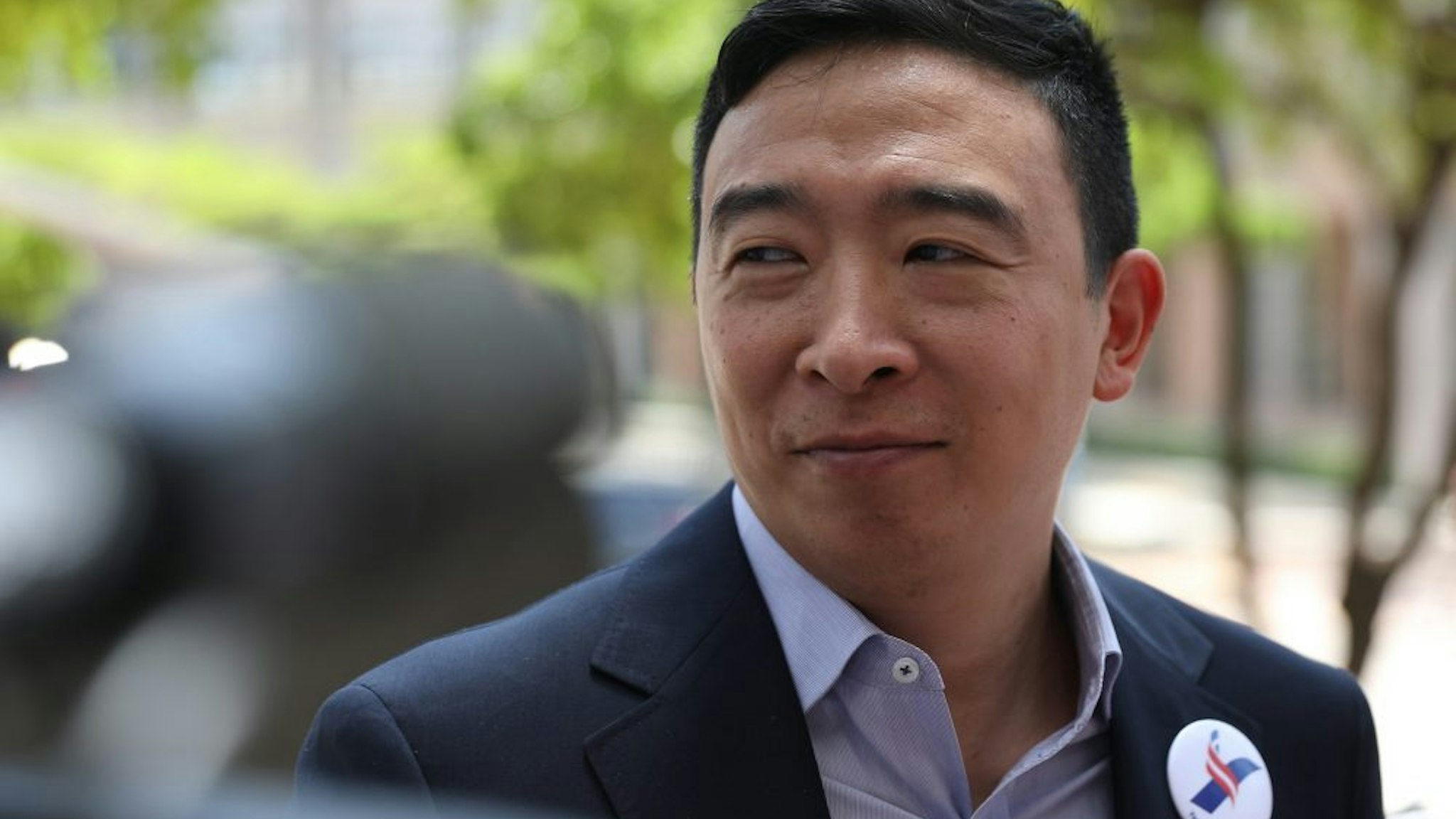 MIAMI, FLORIDA - JUNE 26: Democratic presidential candidate Andrew Yang speaks to media outside the Knight Concert Hall of the Adrienne Arsht Center for the Performing Arts of Miami-Dade County June 26, 2019 in Miami, Florida. A field of 20 Democratic presidential candidates was split into two groups of 10 for the first debate of the 2020 election, taking place over two nights at Knight Concert Hall of the Adrienne Arsht Center for the Performing Arts of Miami-Dade County, hosted by NBC News, MSNBC, and Telemundo. Yang is participating in the second night's debate.