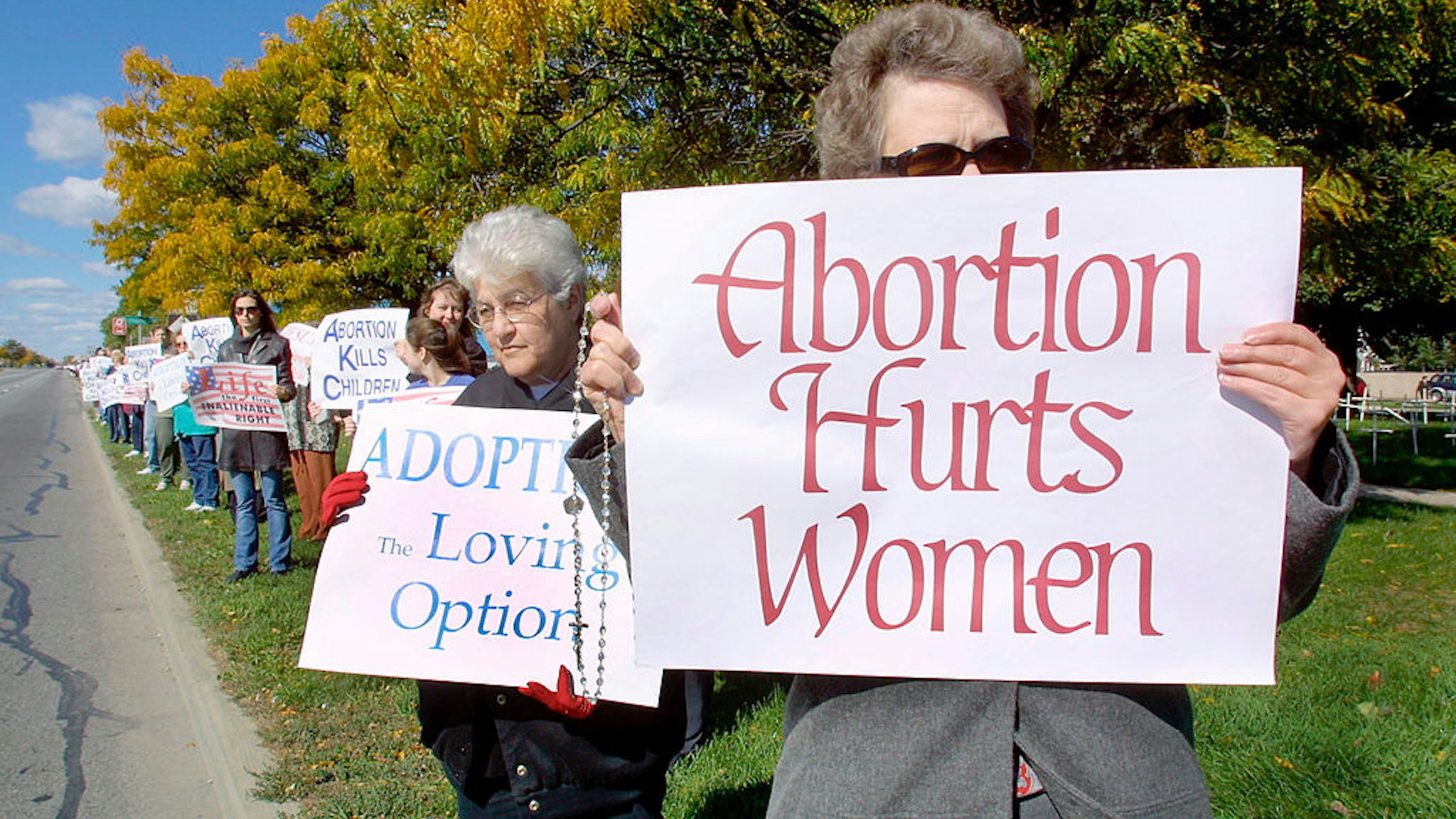 395471 03: Pro-life supporters gather along a two-mile stretch of Woodward Avenue October 7, 2001 in Royal Oak, Michigan. Approximately 2,000 abortions are performed in the United States each day. (Photo by Bill Pugliano/Getty Images)