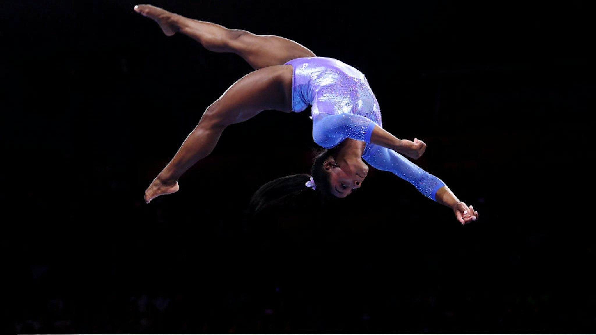STUTTGART, GERMANY - OCTOBER 13: Simone Biles of USA competes on Balance Beam during the Apparatus Finals on Day 10 of the FIG Artistic Gymnastics World Championships at Hanns Martin Schleyer Hall on October 13, 2019 in Stuttgart, Germany. (Photo by Laurence Griffiths/Getty Images)STUTTGART, GERMANY - OCTOBER 13: Simone Biles of USA competes on Balance Beam during the Apparatus Finals on Day 10 of the FIG Artistic Gymnastics World Championships at Hanns Martin Schleyer Hall on October 13, 2019 in Stuttgart, Germany. (Photo by Laurence Griffiths/Getty Images)