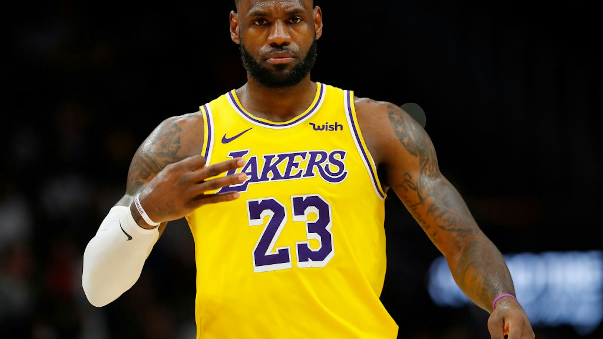 ATLANTA, GEORGIA - DECEMBER 15: LeBron James #23 of the Los Angeles Lakers reacts after hitting a three-point basket against the Atlanta Hawks in the second half at State Farm Arena on December 15, 2019 in Atlanta, Georgia. NOTE TO USER: User expressly acknowledges and agrees that, by downloading and/or using this photograph, user is consenting to the terms and conditions of the Getty Images License Agreement. (Photo by Kevin C. Cox/Getty Images)
