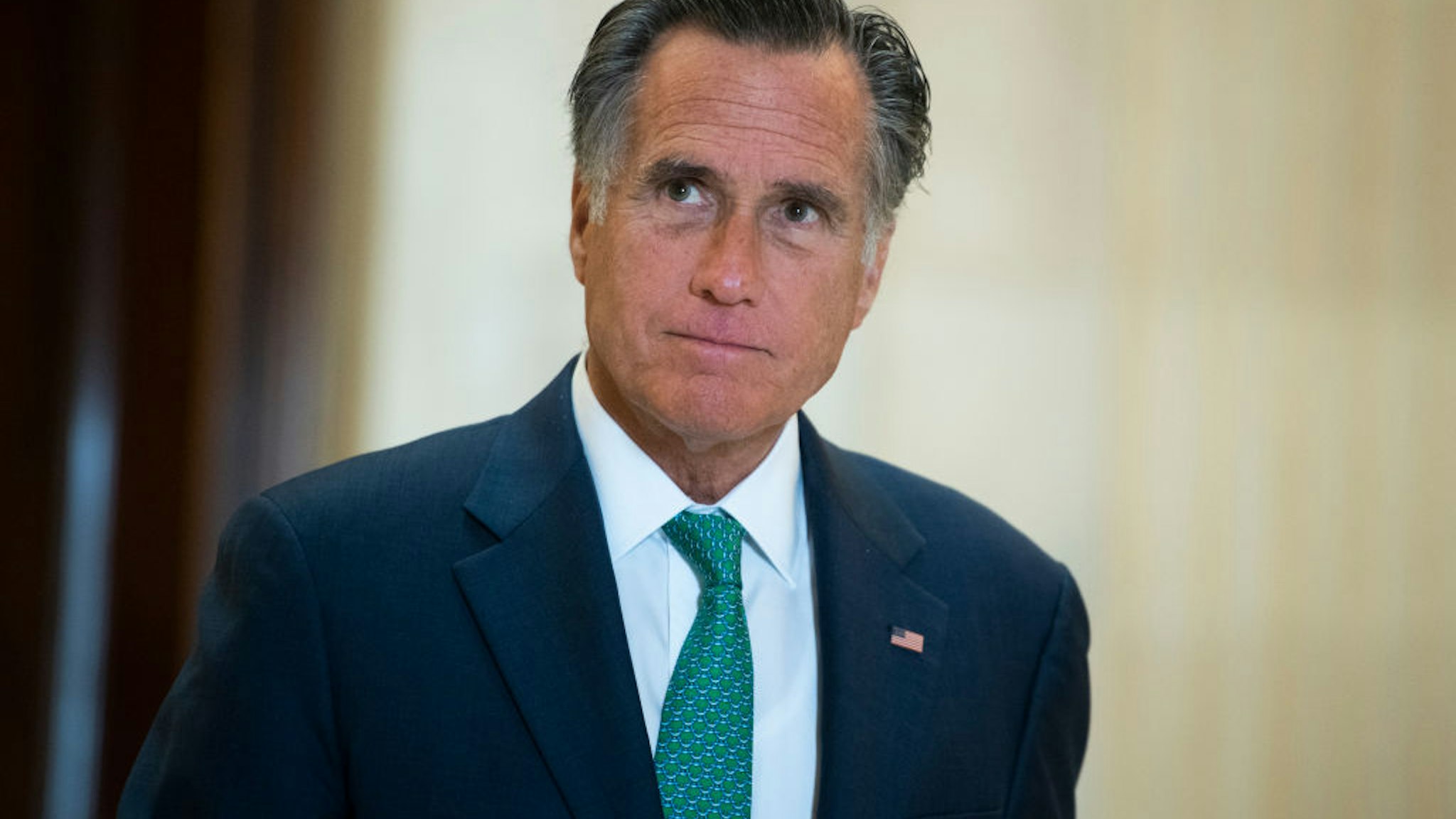 UNITED STATES - MARCH 17: Sen. Mitt Romney, R-Utah, leaves the Senate Republican Policy luncheon in Russell Building on Tuesday, March 17, 2020. Treasury Secretary Steven Mnuchin attended to discuss the coronavirus relief package. (Photo By Tom Williams/CQ-Roll Call, Inc via Getty Images)