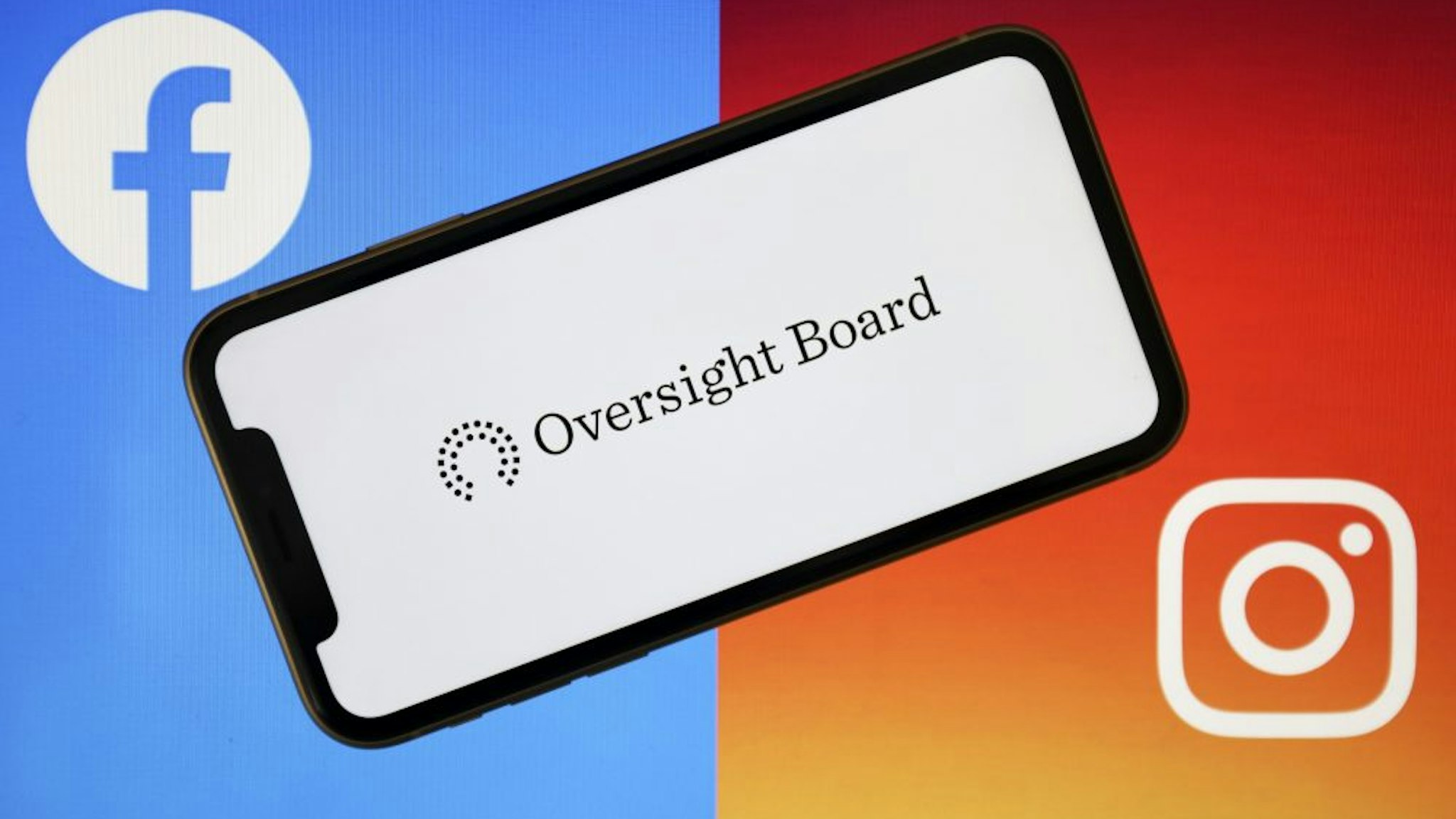 ANKARA, TURKEY - MAY 07: Oversight Board logo is seen on a smart phone with Facebook and Instagram logos at the background in Ankara, Turkey on May 07, 2020.