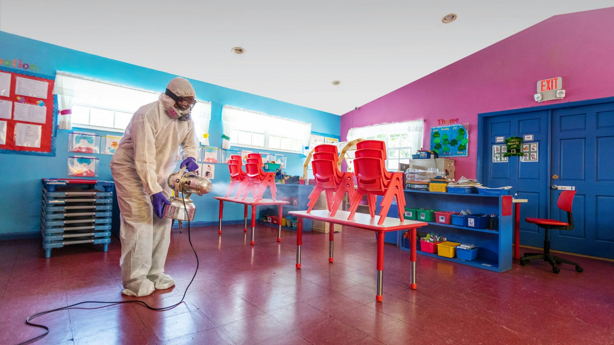A classroom being sanitized.