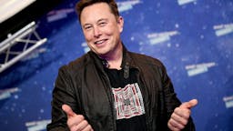 Elon Musk SpaceX owner and Tesla CEO Elon Musk poses as he arrives on the red carpet for the Axel Springer Awards ceremony, in Berlin, on December 1, 2020.