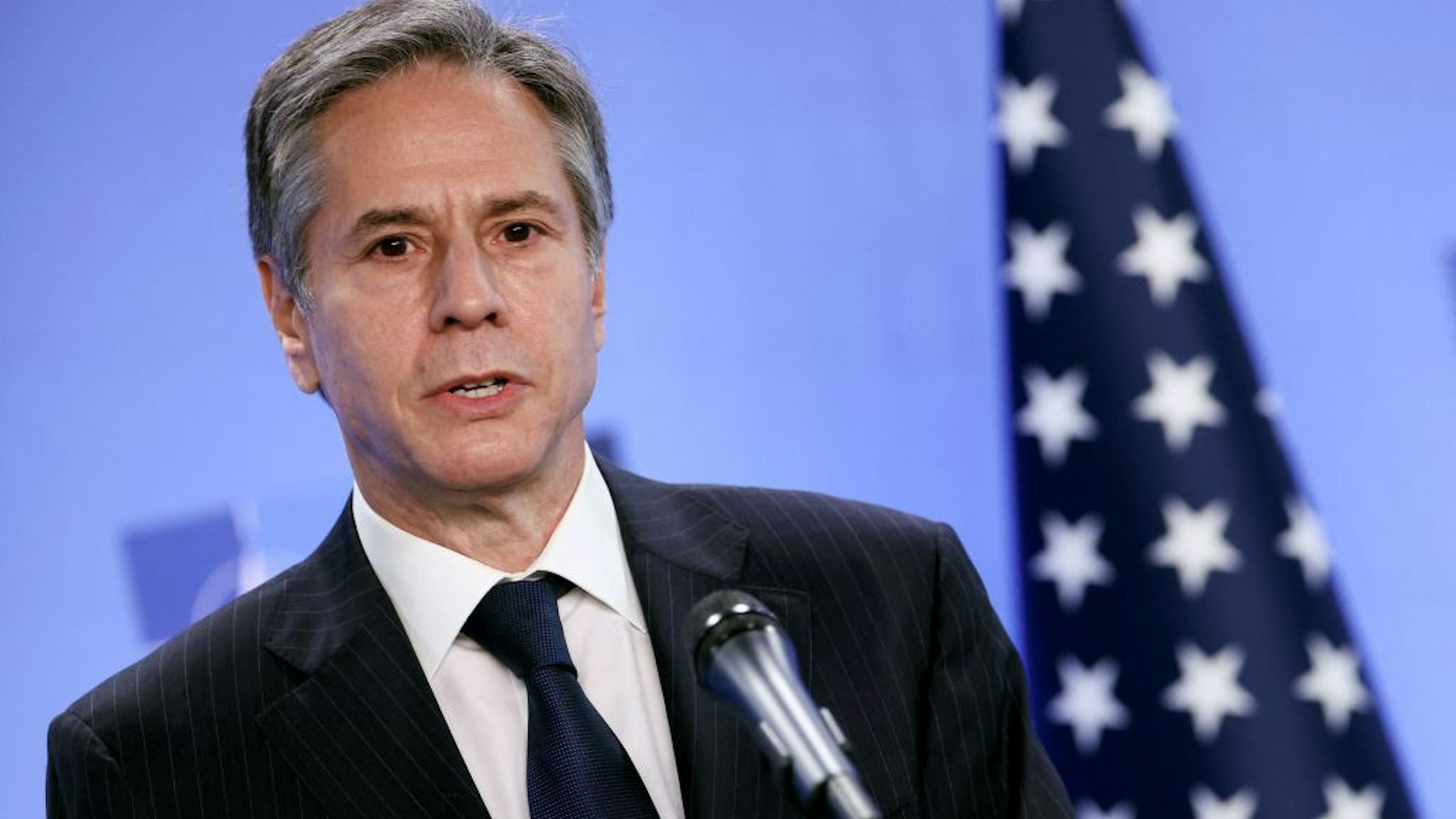 US Secretary of State Antony Blinken speaks during a press conference with transatlantic alliance NATO's chief on April 14, 2021 at NATO's headquarters in Brussels, as foreign ministers of the US, Britain, France and Germany hold talks today on Afghanistan, after the United States announced the withdrawal of all its troops from the country by September 11.