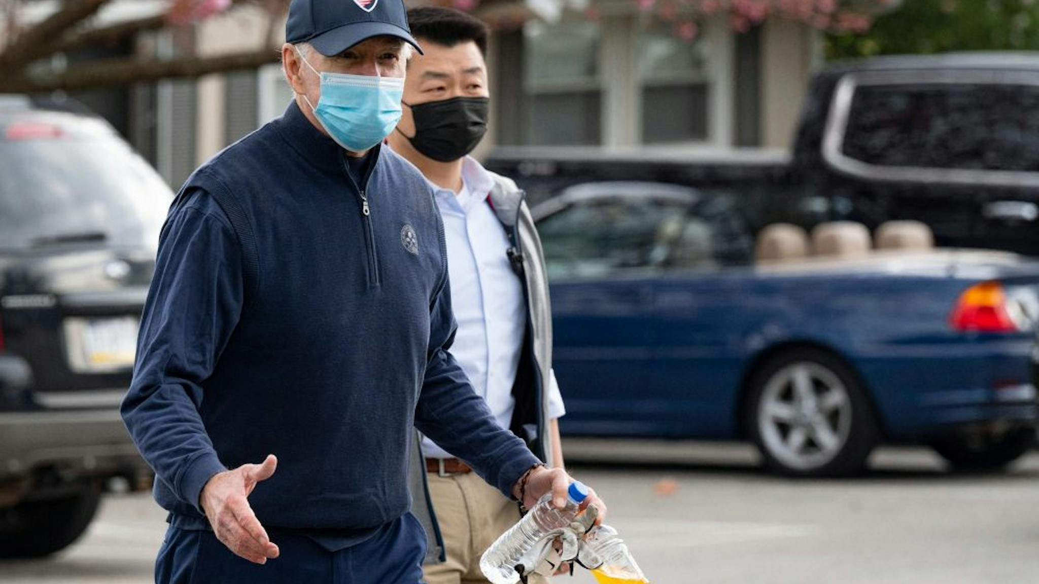 Joe Biden US President Joe Biden leaves his cart after a round of golf at Wilmington Country Club in Wilmington, Delaware, on April 17, 2021. - President Joe Biden played golf for the first time in his presidency Saturday, hitting the fairways in his home city of Wilmington.