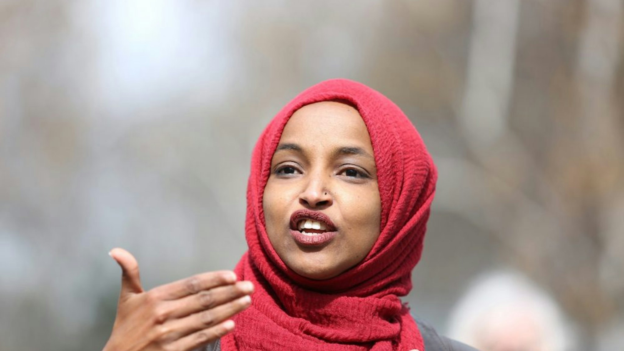 Representative Ilhan Omar, a Democrat from Minnesota, speaks during a press conference near the site of Daunte Wright's death in Brooklyn Center, Minnesota, U.S., on Tuesday, April 20, 2021. The case of the former Minneapolis police officer accused of killing George Floyd went to the jury after Derek Chauvin's defense attorney said the viral video of him kneeling on Floyd's neck and back doesn't tell the entire story.