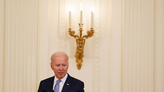 U.S. President Joe Biden speaks before awarding a Medal of Honor to Korean War veteran Army Colonel Ralph Puckett, not pictured, during a ceremony in the East Room of the White House in Washington, D.C., U.S., on Friday, May 21, 2021. South Korean President Moon Jae-in is set to make a last-ditch attempt to bring the U.S. and North Korea together under his watch when he meets Biden, trying to revive dormant nuclear talks in his final year in office. Photographer: Stefani Reynolds/The New York Times/Bloomberg via Getty Images
