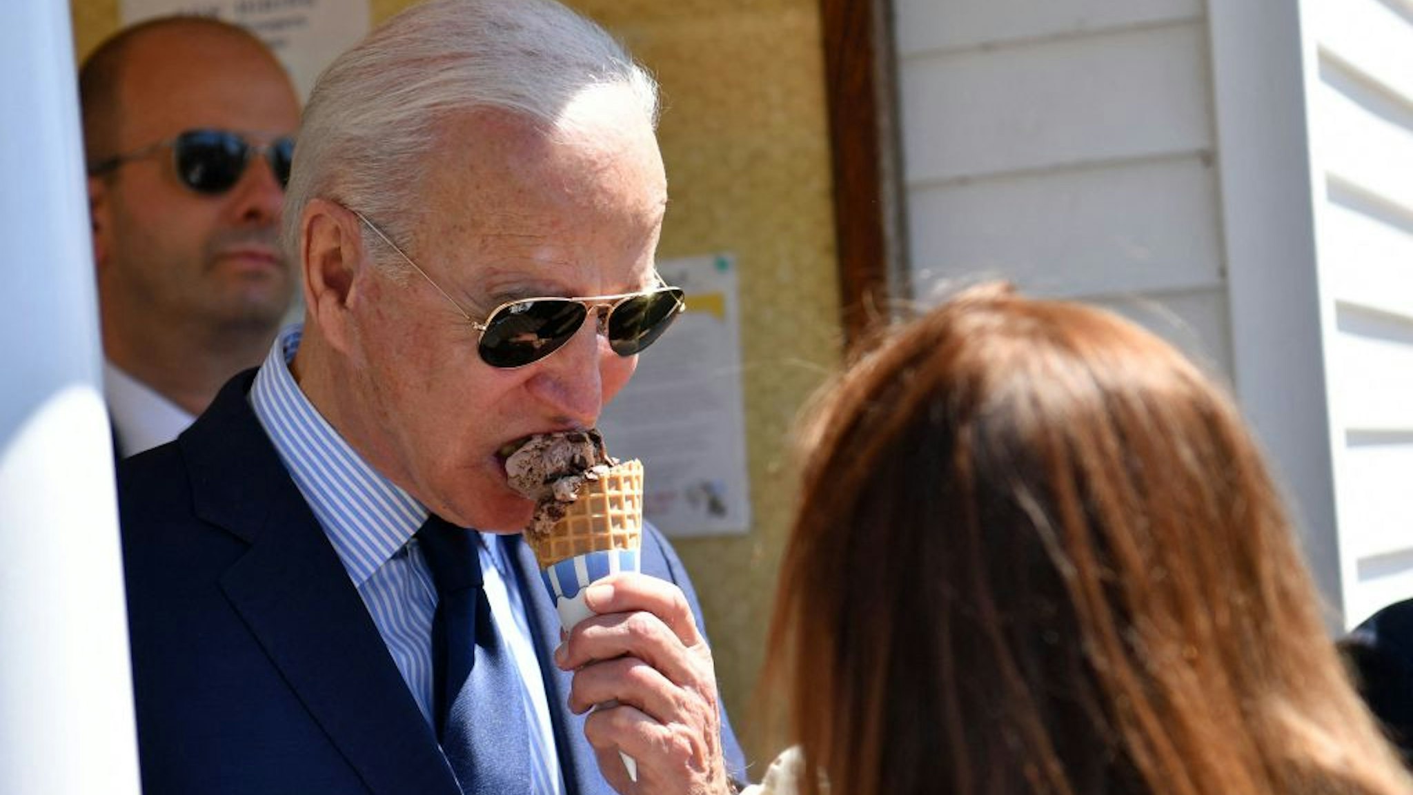 US President Joe Biden eats an ice cream at Honey Hut Ice Cream in Cleveland, Ohio, on May 27, 2021. (Photo by Nicholas Kamm / AFP) (Photo by NICHOLAS KAMM/AFP via Getty Images)