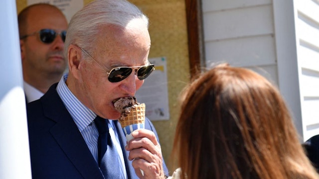 US President Joe Biden eats an ice cream at Honey Hut Ice Cream in Cleveland, Ohio, on May 27, 2021.