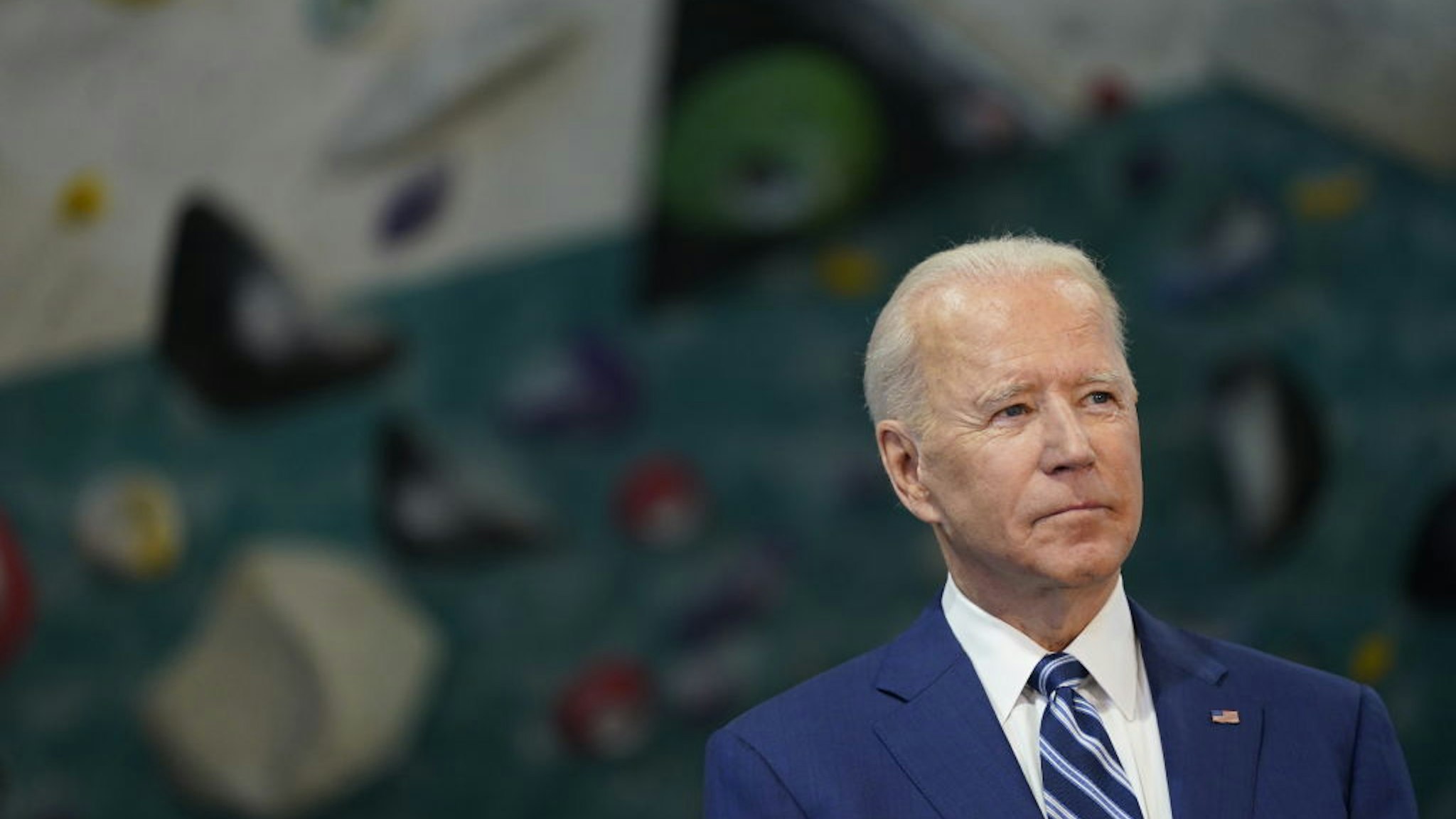 U.S. President Joe Biden pauses while speaking at Sportrock Climbing Center during an event in Alexandria, Virginia, U.S., on Friday, May 28, 2021.