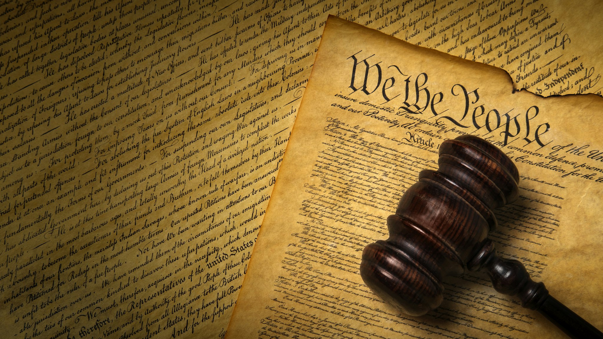 US Constitution with gavel - stock photo