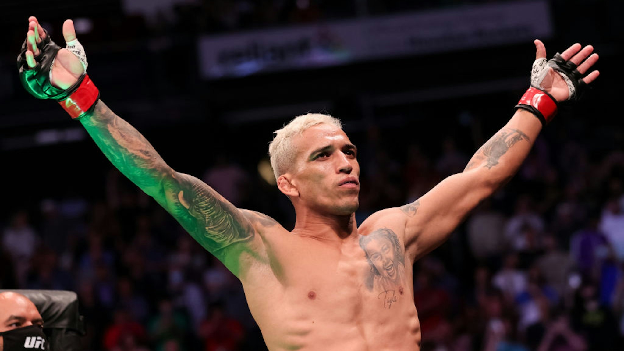 HOUSTON, TEXAS - MAY 15:Charles Oliveira of Brazil gestures to the crowd before facing Michael Chandler during their Championship Lightweight Bout at the UFC 262 event at Toyota Center on May 15, 2021 in Houston, Texas. (Photo by Carmen Mandato/Getty Images)