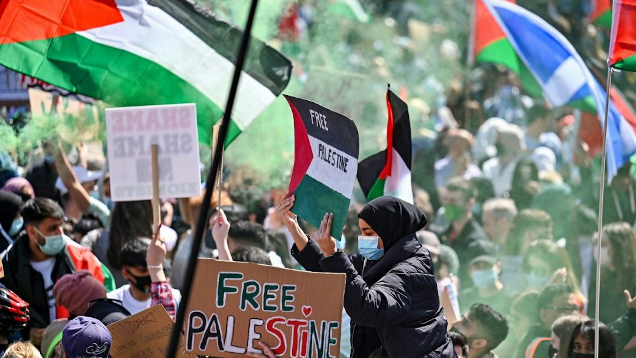 GLASGOW, SCOTLAND - MAY 16: Protestors have gathered in solidarity with the people of Palestine amid ongoing conflict in Gaza on May 16, 2021 in Glasgow, Scotland. The demonstration comes amid spiraling violence in Israel and Palestine and after yesterday's Palestinian Nakba (Catastrophe) Day, which commemorates the expulsion of Arabs from their homes in the 1948 war that forged modern Israel.