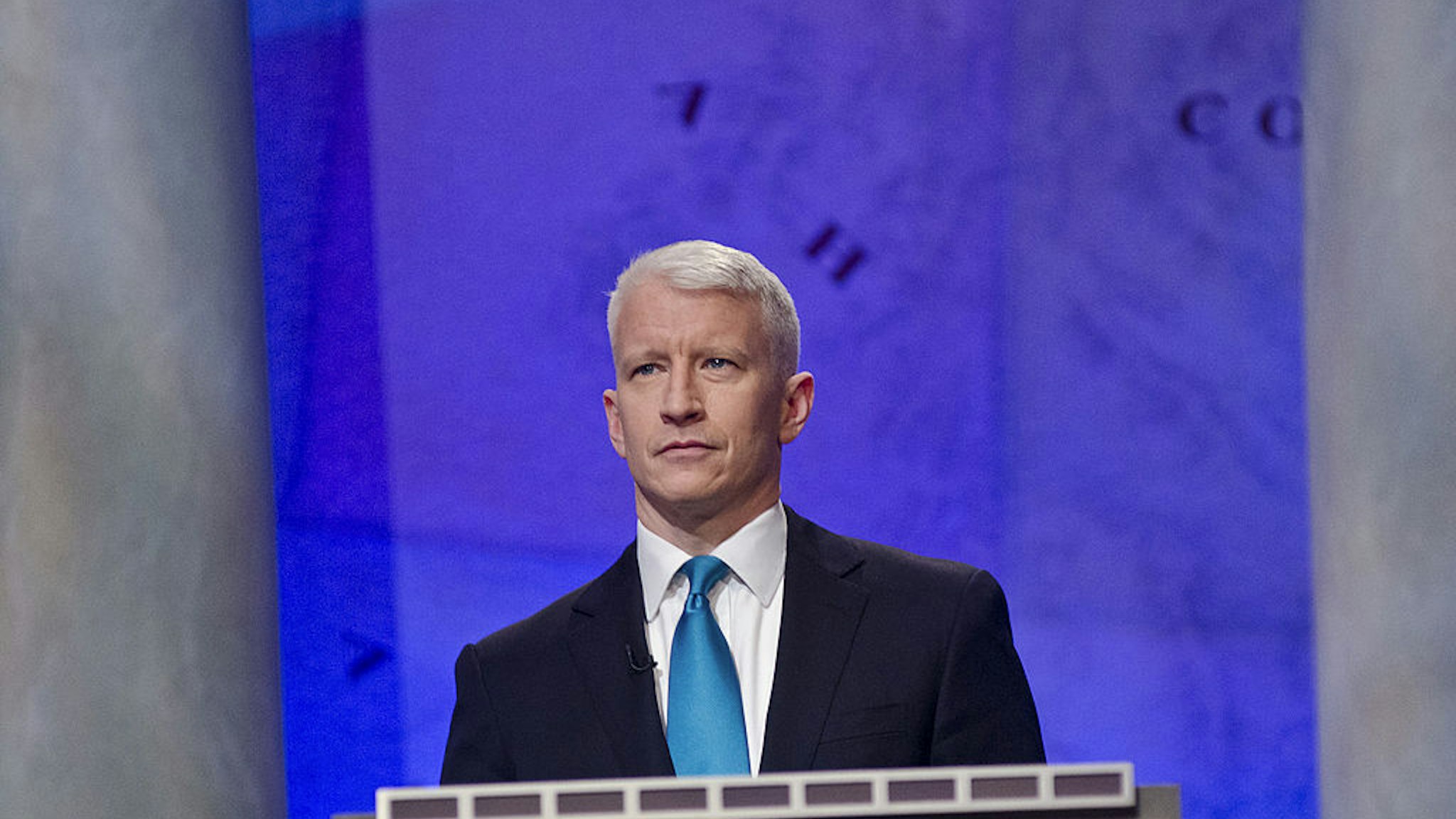 WASHINGTON, DC - APRIL 21: Anderson Cooper speaks during a rehearsal before a taping of Jeopardy! Power Players Week at DAR Constitution Hall on April 21, 2012 in Washington, DC. (Photo by Kris Connor/Getty Images)