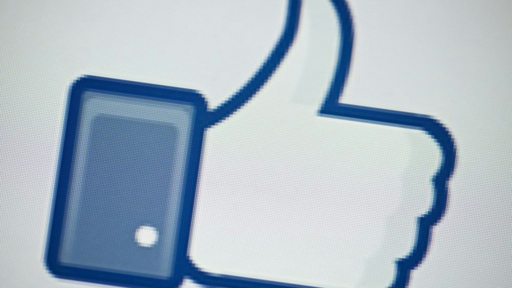 A view of Facebook's "Like" button May 10, 2012 in Washington, DC. Social-networking giant Facebook will go public on the NASDAQ May 18 with its initial public offering, trading under the symbol FB, in an effort to raise $10.6 billion.
