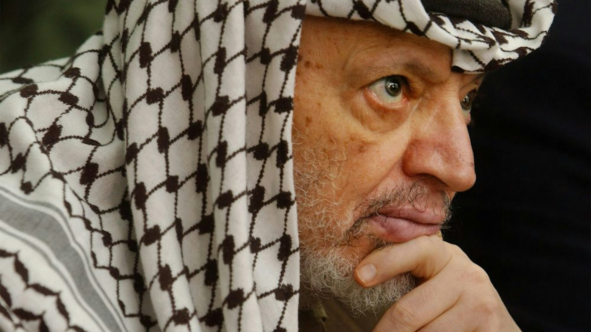 405490 02: Palestinian leader Yasser Arafat attends Friday prayers May 17, 2002 at his headquarters in the West Bank town of Ramallah. Arafat said Friday there could not free Palestinian elections until the Israel military occupation ended in the West Bank and Gaza Strip.