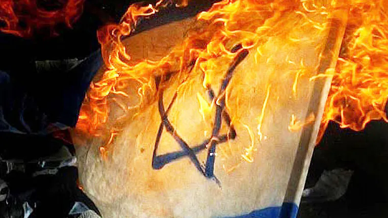 Iranian Tries To Set Israeli Flag On Fire, Sets Himself On Fire Instead