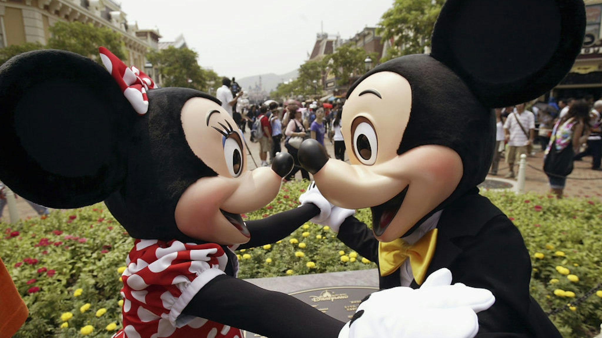 HONG KONG, CHINA - SEPTEMBER 12: Disney characters Mickey and Minnie Mouse welcome visitors during the grand opening day of Hong Kong Disneyland September 12, 2005 in Hong Kong (Photo by MN Chan/Getty Images)