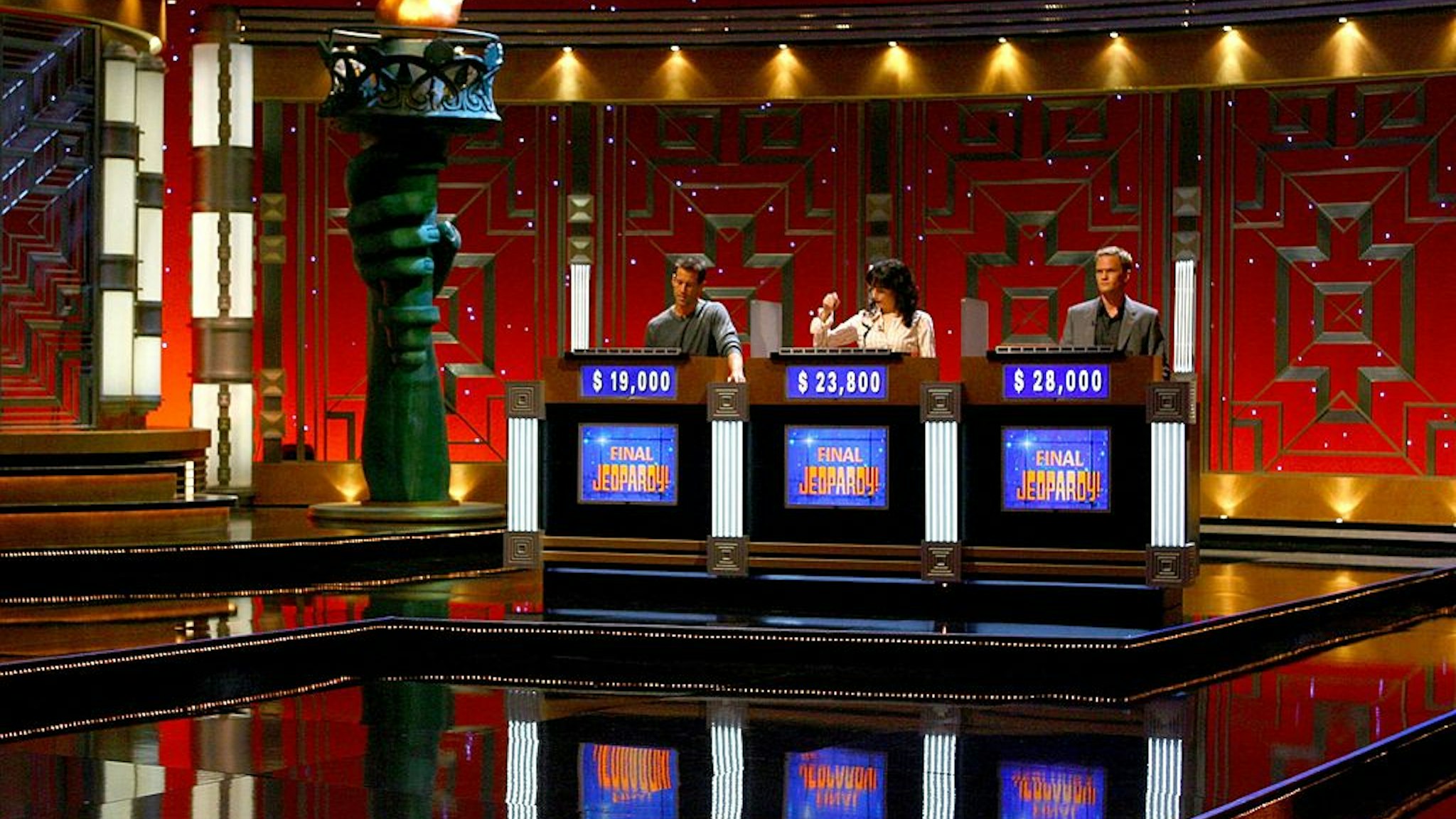 Actors James Denton, Bebe Neuwirth and Neil Patrick Harris during a rehearsal for Celebrity Jeopardy at Radio City Music Hall on October 08, 2006 in New York City.