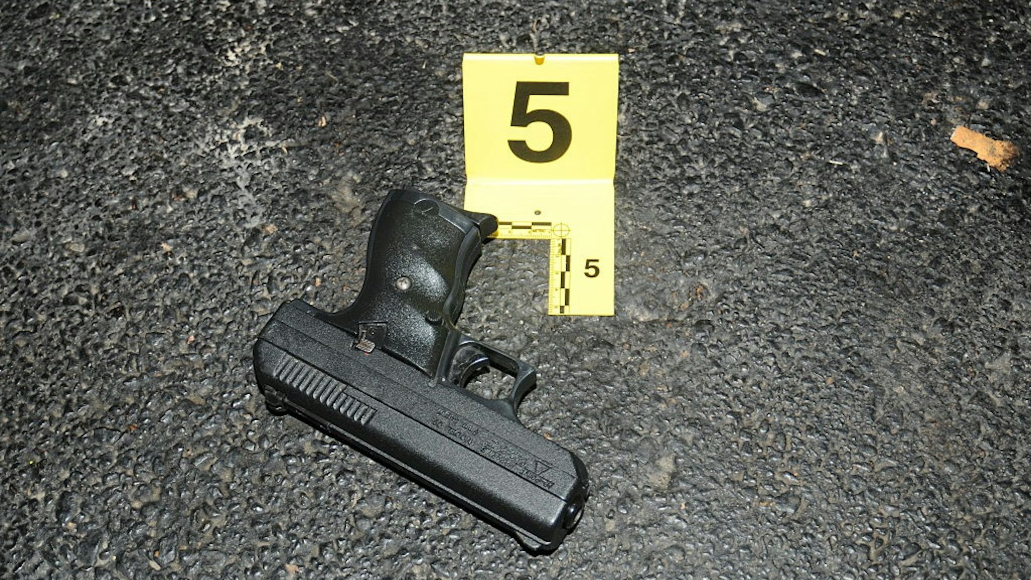 BERKELEY, MISSOURI - DECEMBER 24: In this handout provided by the St. Louis County Police Department, a handgun is pictured that was recovered following the officer involved shooting at the Mobil on the Run gas station on December 24, 2014 in Berkeley, Missouri.